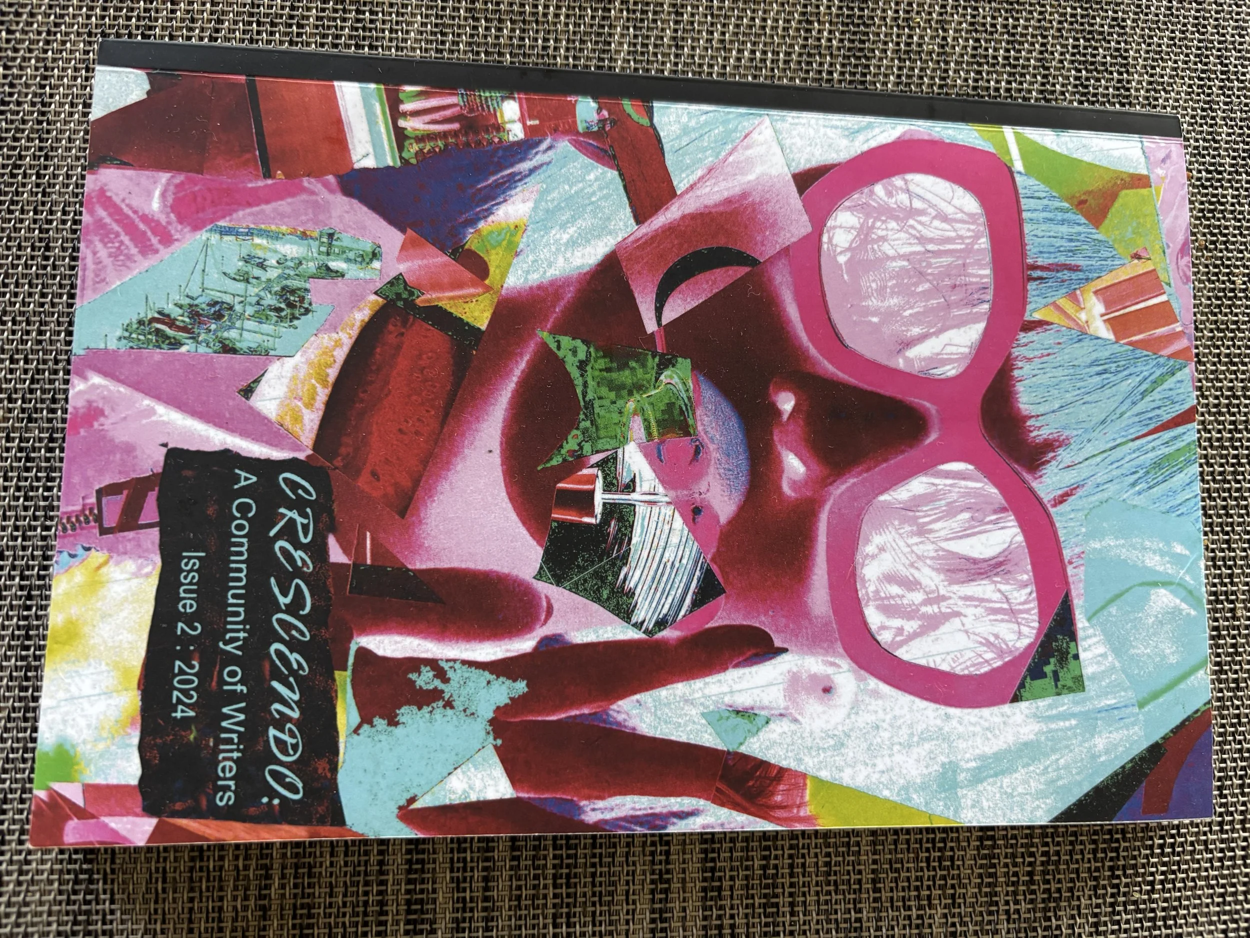 Colorful collage magazine cover with pink sunglasses and abstract shapes, includes black label with white text reading, 'RESOLUTION: A Community of Writers Issue 2 2024'.