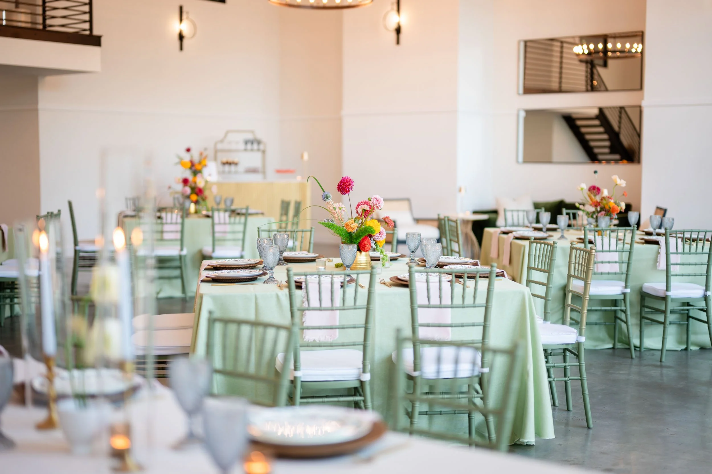 Wedding reception table decor with candles and greenery at The Hall Southall Meadows