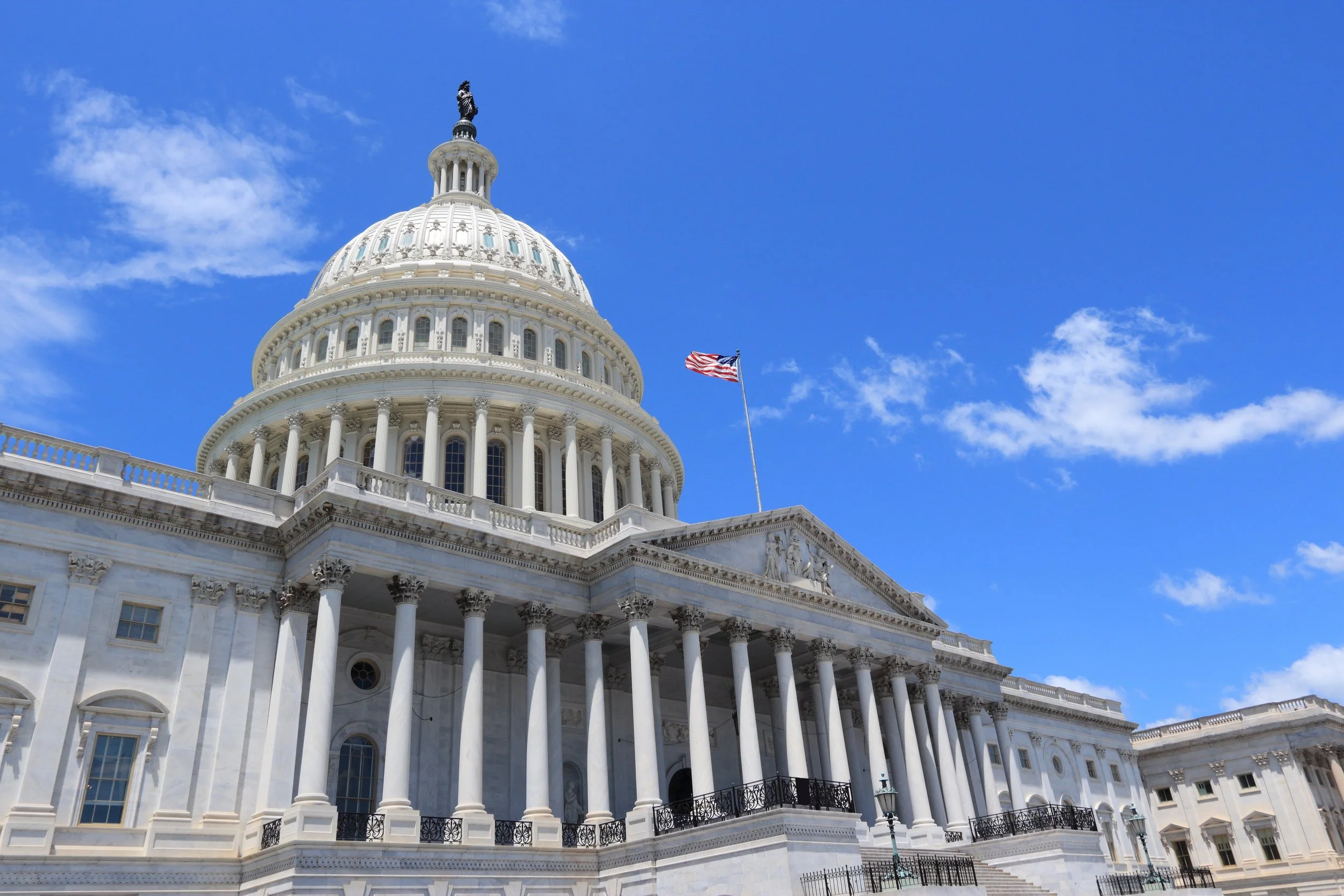 Federal building representing the FCC framework that governs pole attachments under Section 224