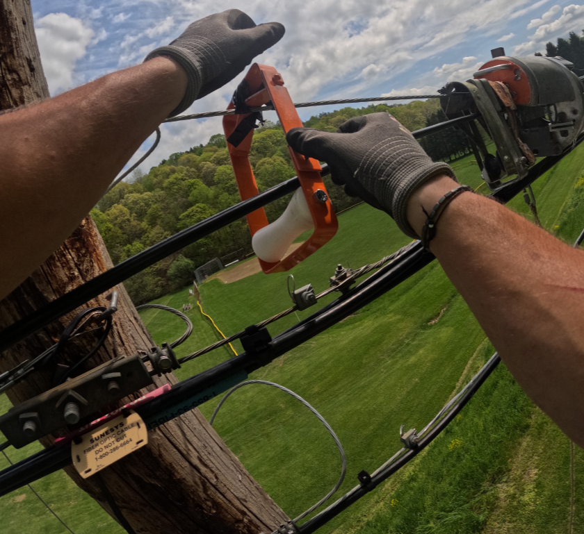 Grounding and Bonding Aerial Fiber: Lightning Protection That Holds Up in Storm Season