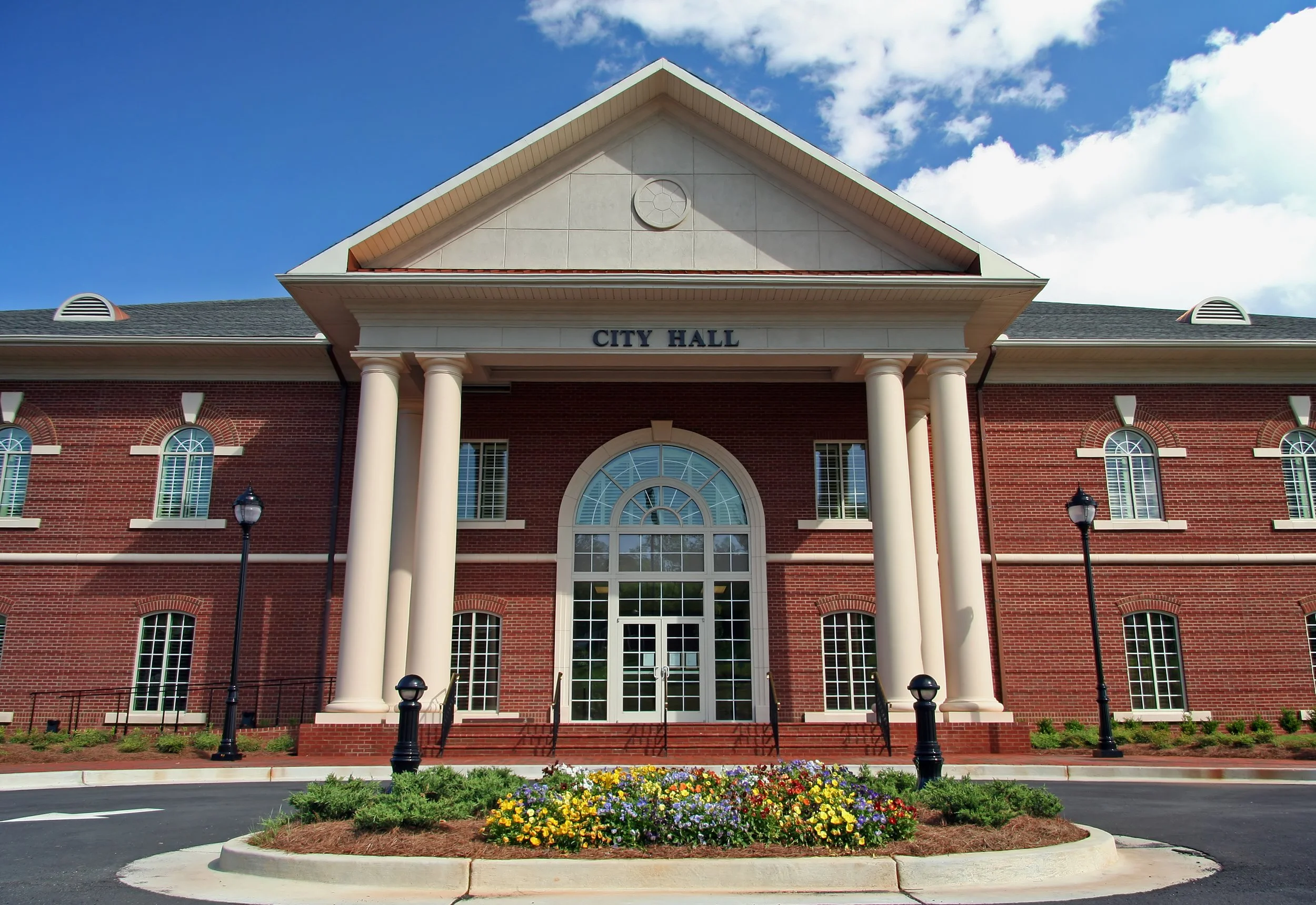 Municipal government building where franchise agreements between telecommunications operators and local jurisdictions are negotiated and approved.