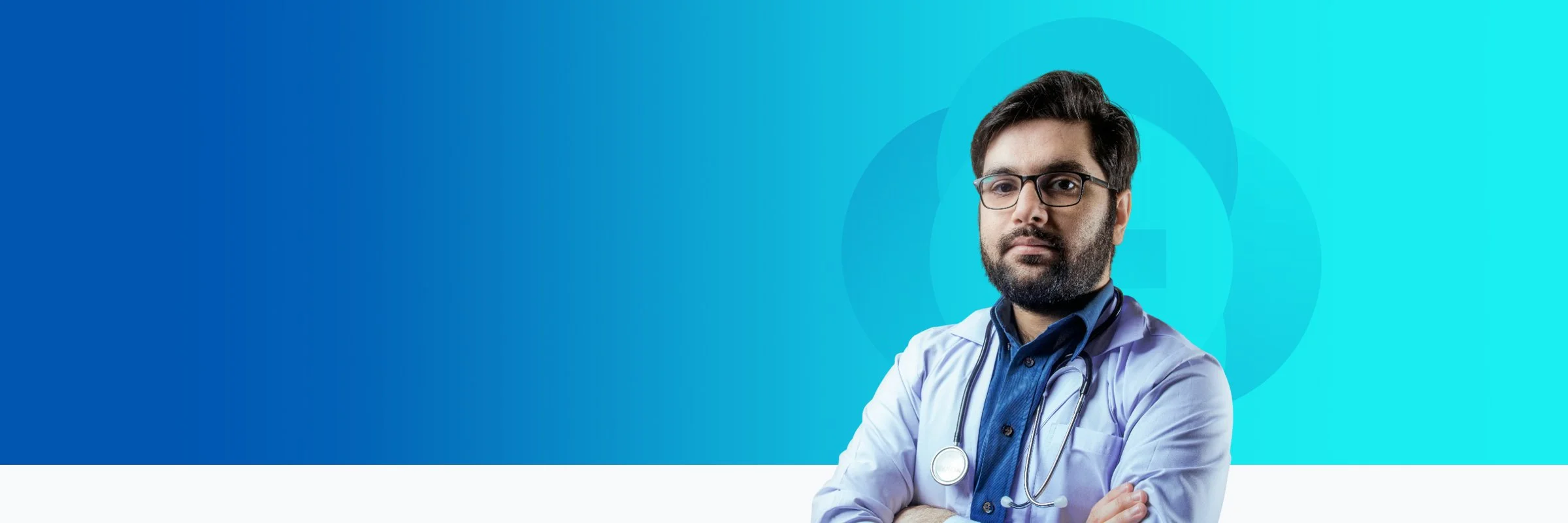 A male doctor with glasses and a beard, wearing a white coat and stethoscope, standing with arms crossed against a blue gradient background.