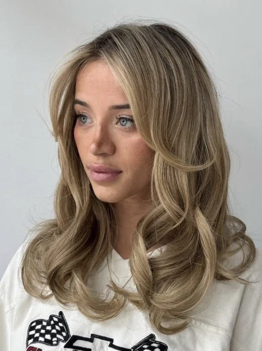 Dimensional blonde color by Seventy Seven Hair Lounge in Alpharetta