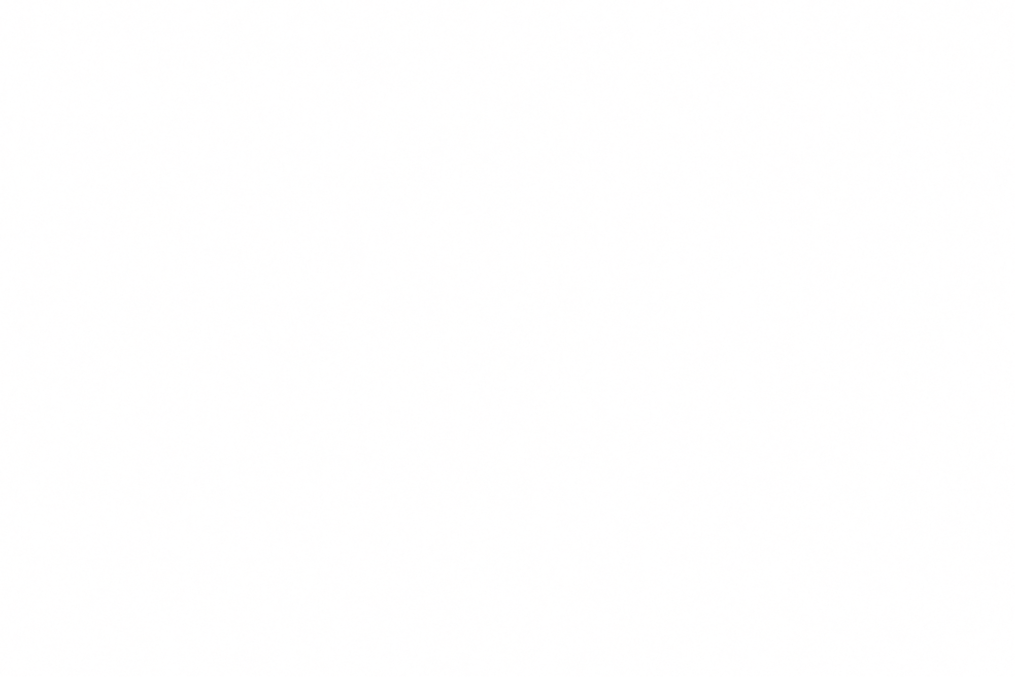Close-up of a speckled surface with black, pink, and white colors.