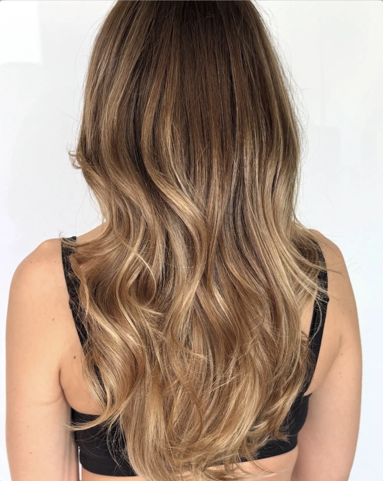 Custom hair color by Seventy Seven Hair Lounge in Alpharetta