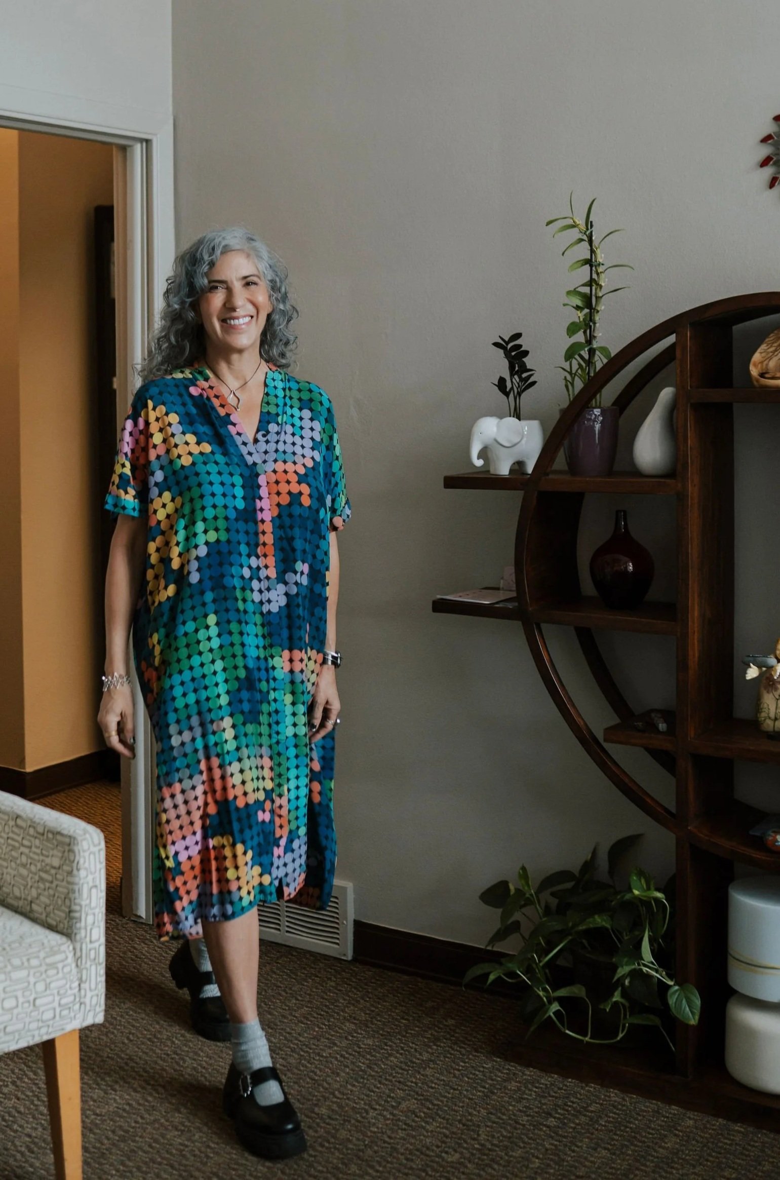 Dr. Dacker walking into Wild Woman Wellness Medicine's waiting room