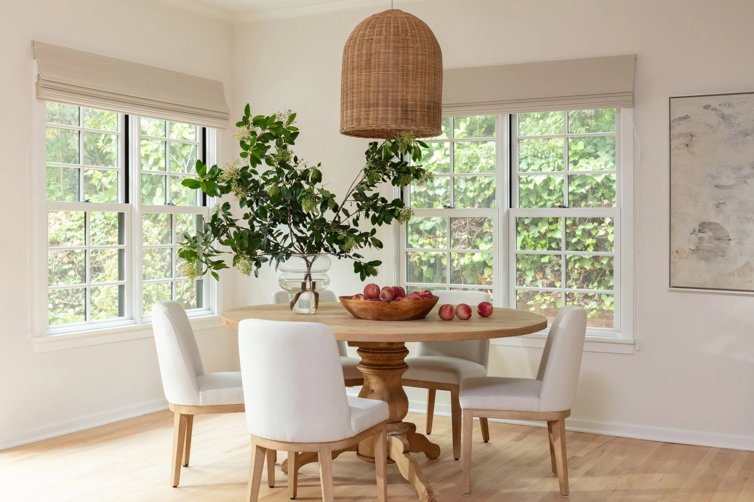 Breakfast room featuring custom windows, natural wood furnishings, and bright contemporary finishes, completed by JBurton General Contractor in Brentwood, Los Angeles.
