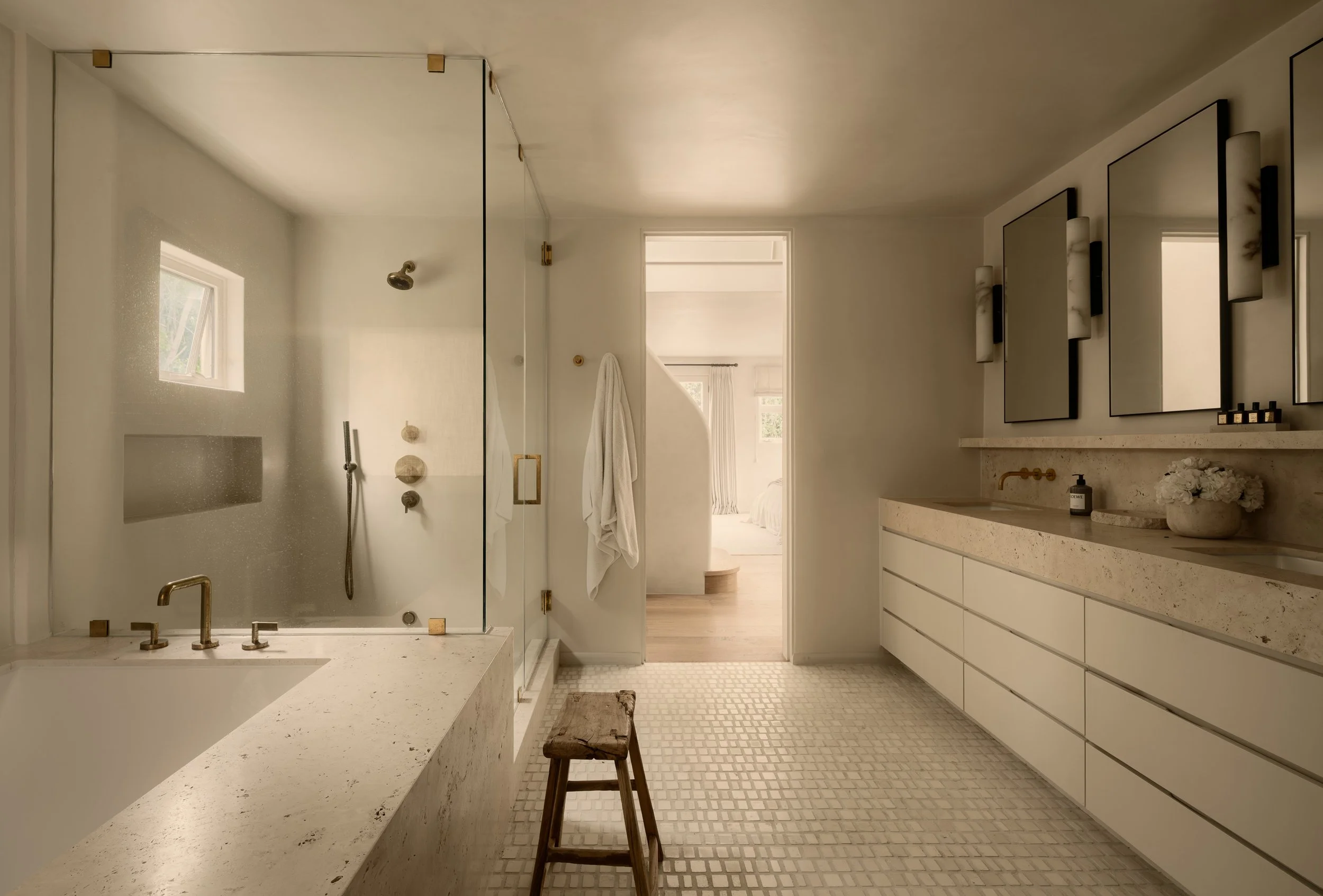 Spa-inspired primary bathroom with a freestanding soaking tub, walk-in shower, and floating double vanity, completed by JBurton General Contractor in Benedict Canyon, Los Angeles.