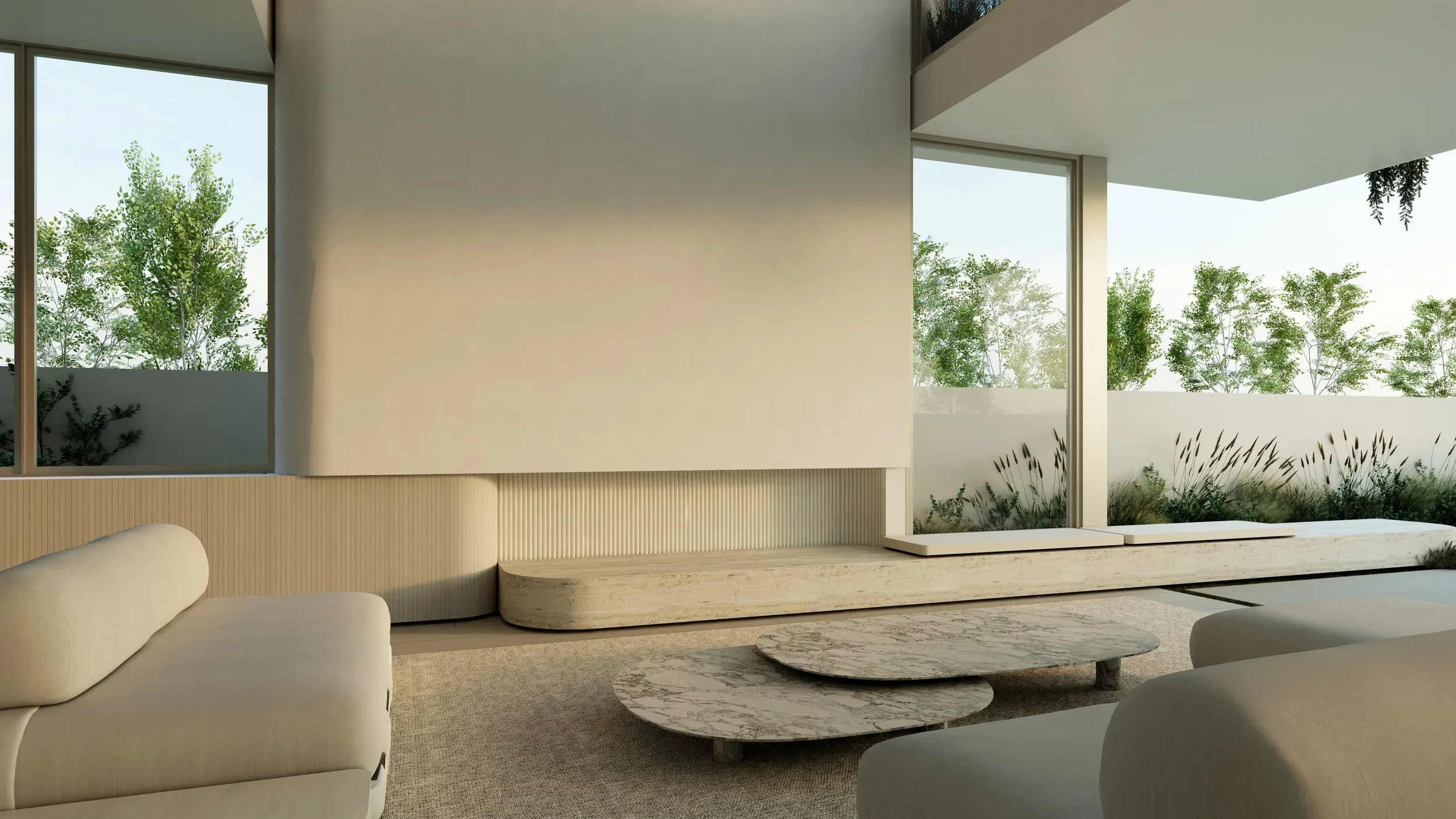 Minimalist fireplace design in a luxury Pacific Palisades fire rebuild, featuring natural stone finishes, floor-to-ceiling walls, and contemporary interior architecture by JBurton General Contractor.
