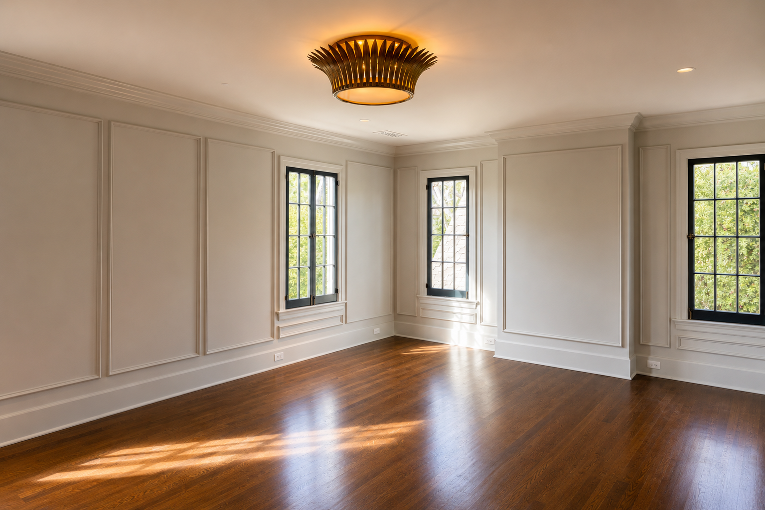 Formal living room with restored millwork, hardwood floors, and classic architectural details, remodeled by JBurton General Contractor in Hancock Park, Los Angeles.