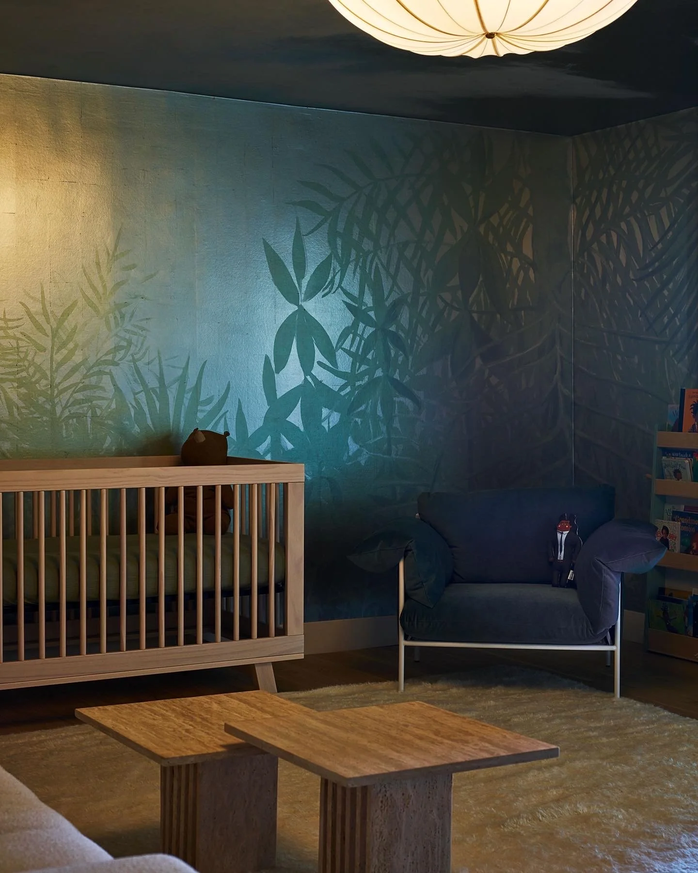 Custom lounge featuring an artistic wall mural and contemporary finishes, remodeled by JBurton General Contractor in Hollywood Hills, Los Angeles.