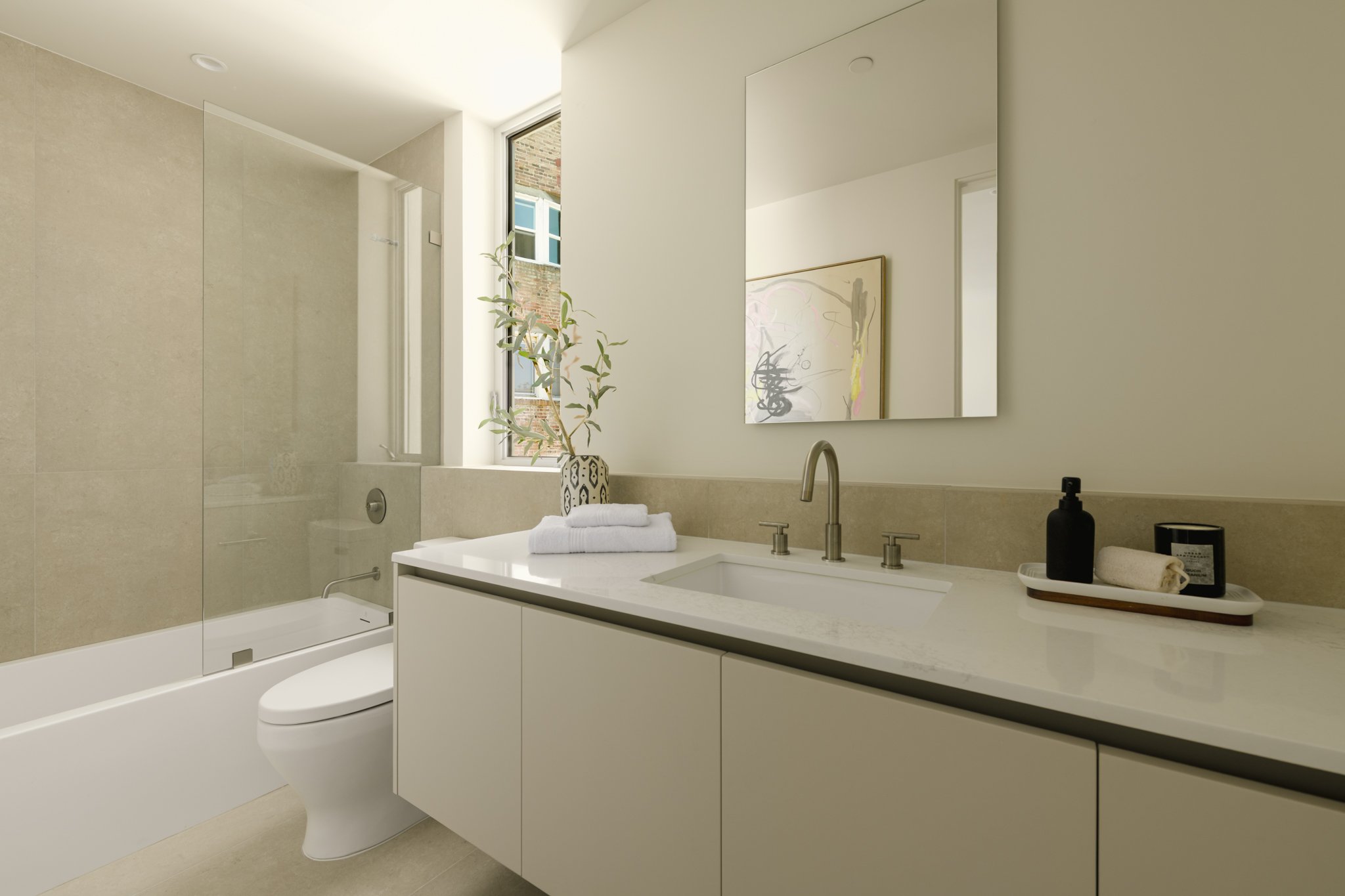 Modern bathroom with a custom double vanity, minimalist fixtures, and clean contemporary finishes, completed by JBurton General Contractor in Silver Lake, Los Angeles.