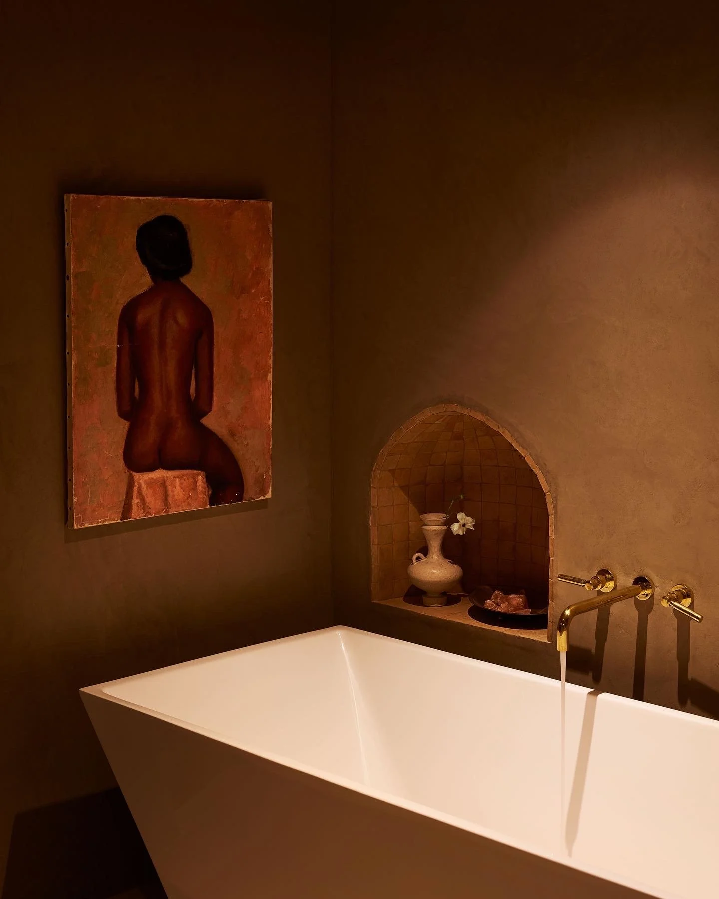 Spa-inspired bathroom with a freestanding soaking tub and custom plaster finishes, remodeled by JBurton General Contractor in Hollywood Hills, Los Angeles.
