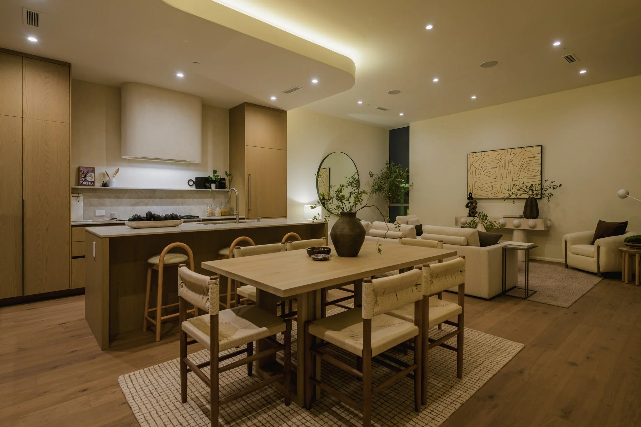 Contemporary dining area connected to a custom kitchen in a new construction townhome built by JBurton General Contractor in Silver Lake, Los Angeles.