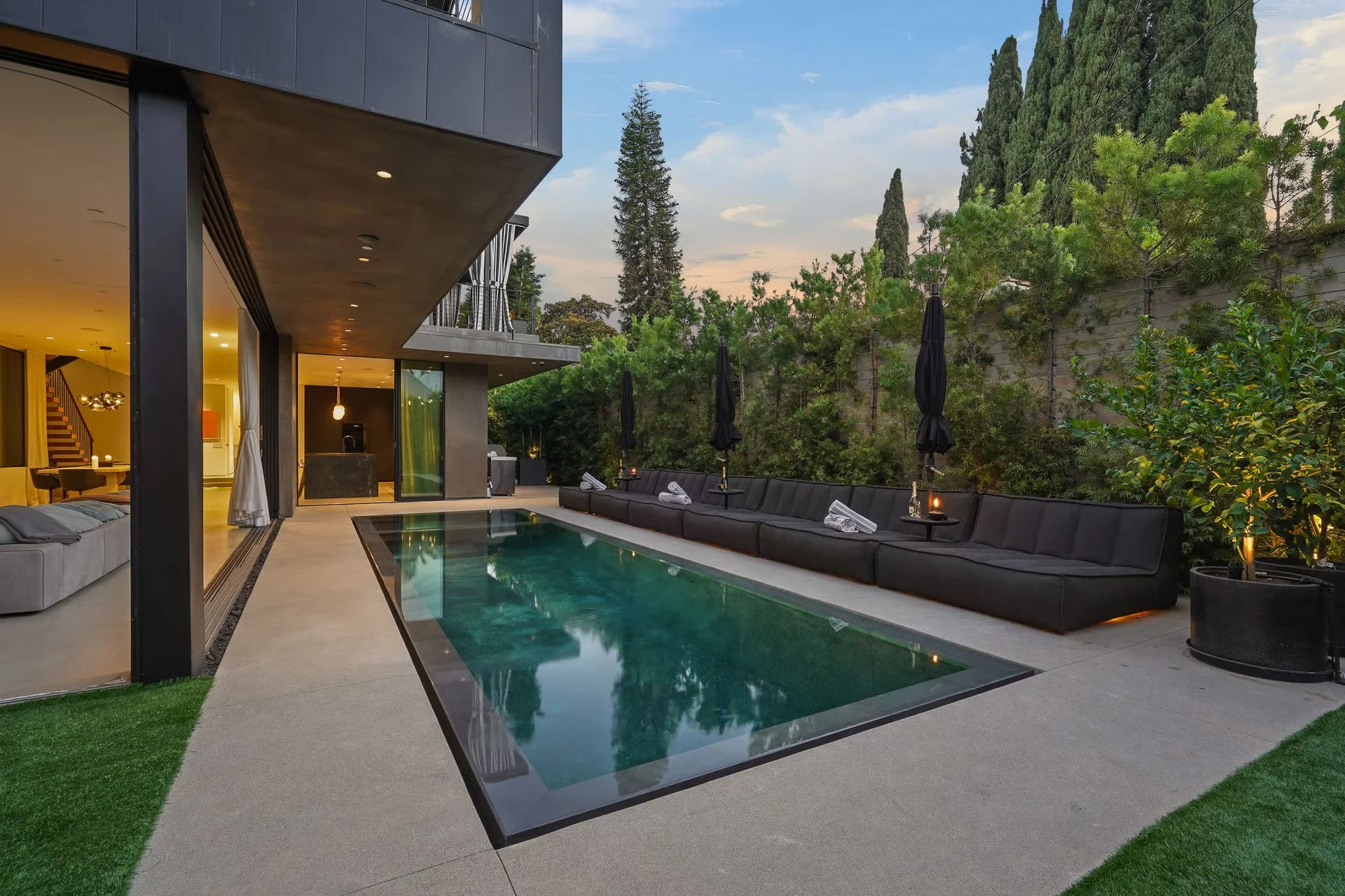 Custom Beverly Grove residence with a modern swimming pool, seamless indoor-outdoor design, and premium architectural finishes by JBurton General Contractor.