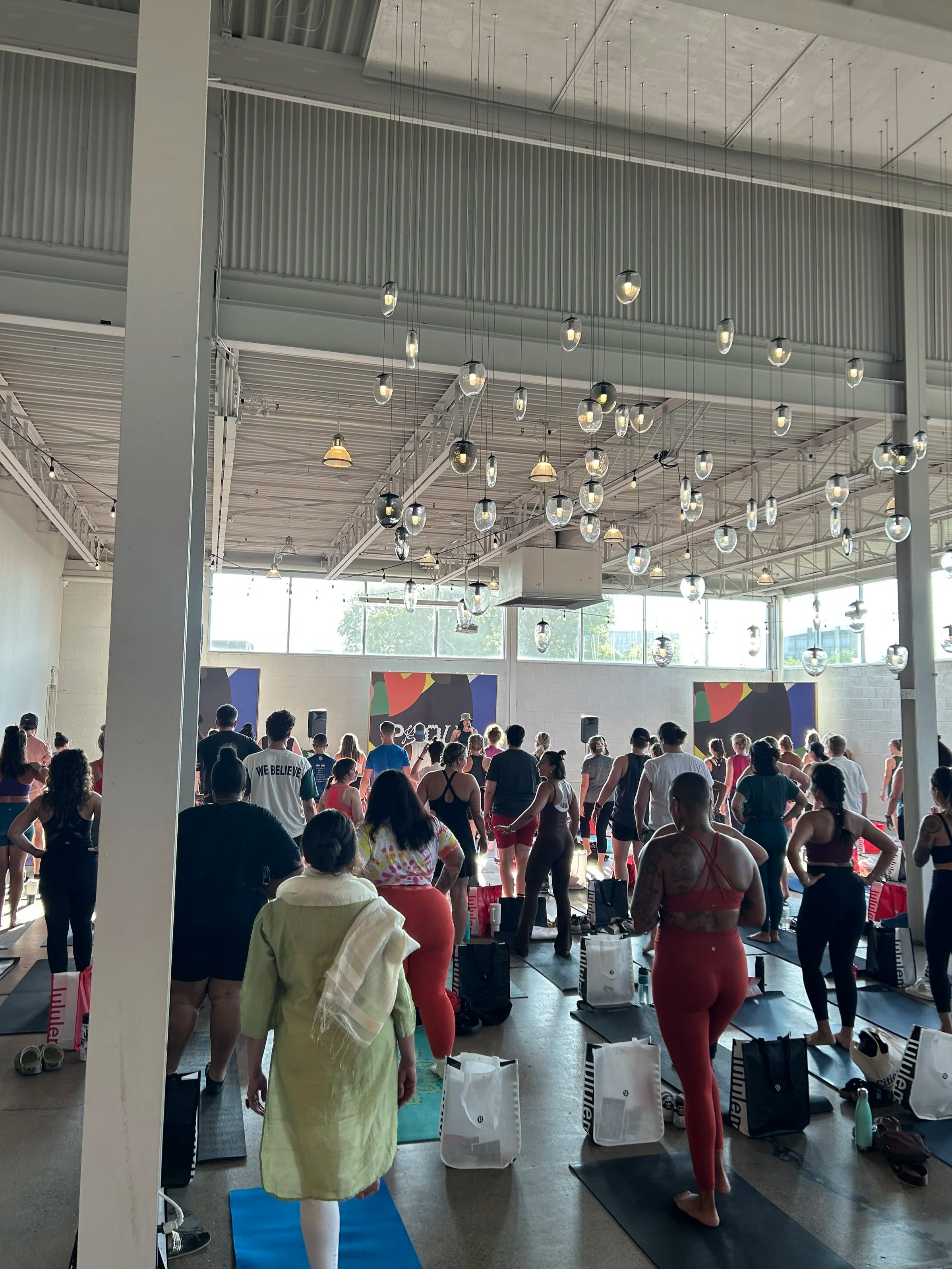 Large community wellness event in an industrial indoor venue