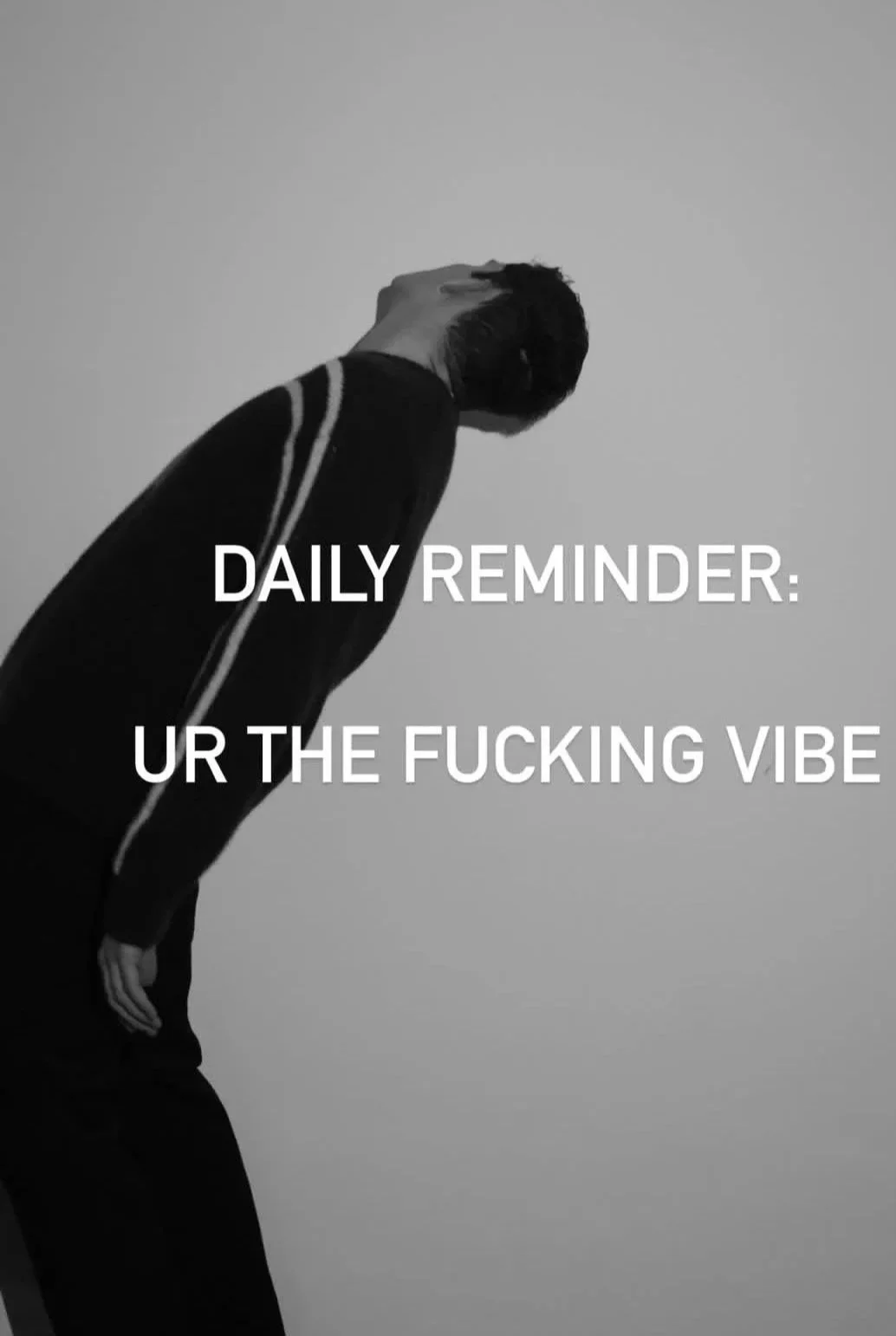 Black and white portrait of a man with motivational text overlay