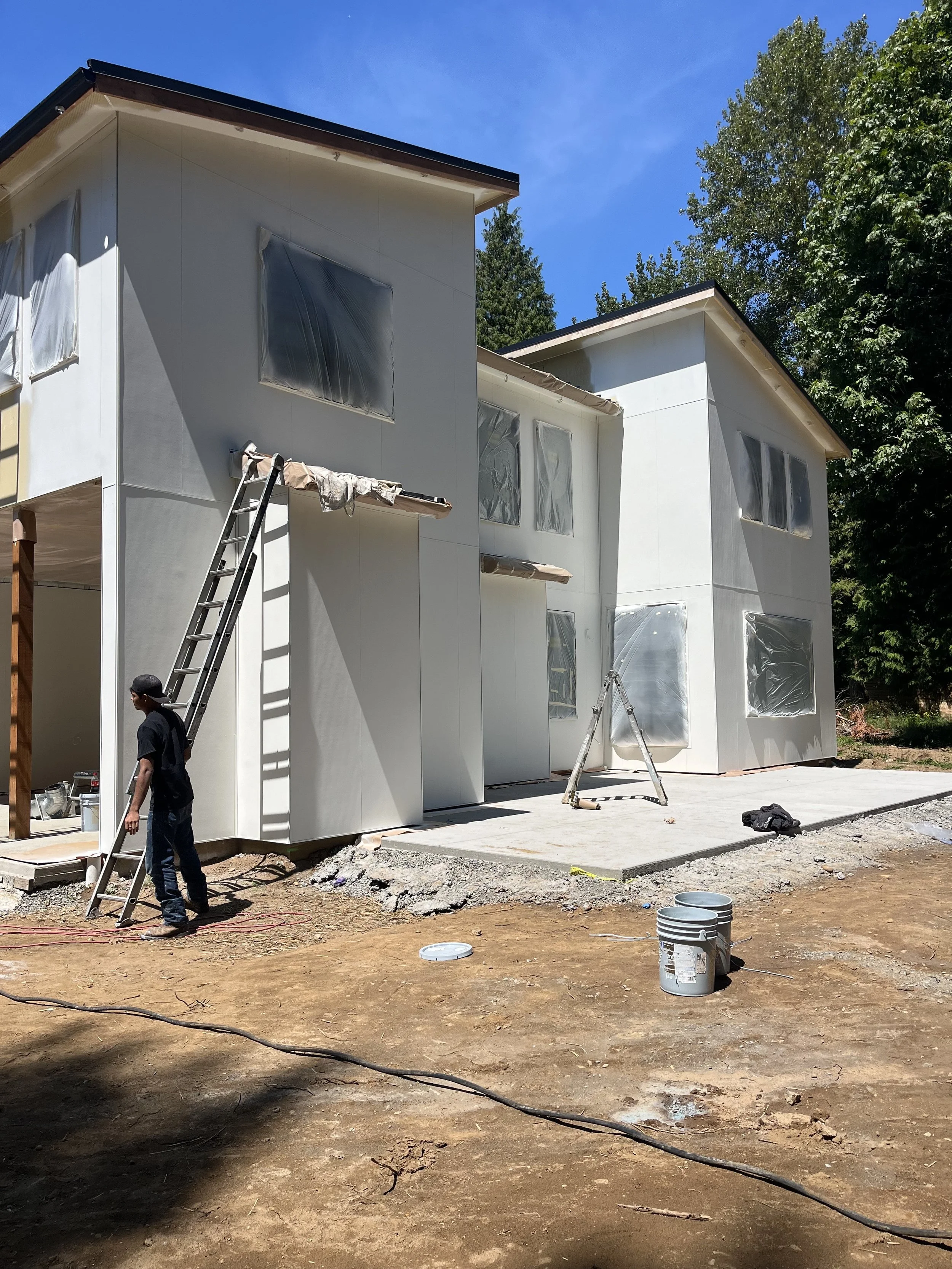 Contractor preparing exterior of home in Blaine, WA for painting and finish work
