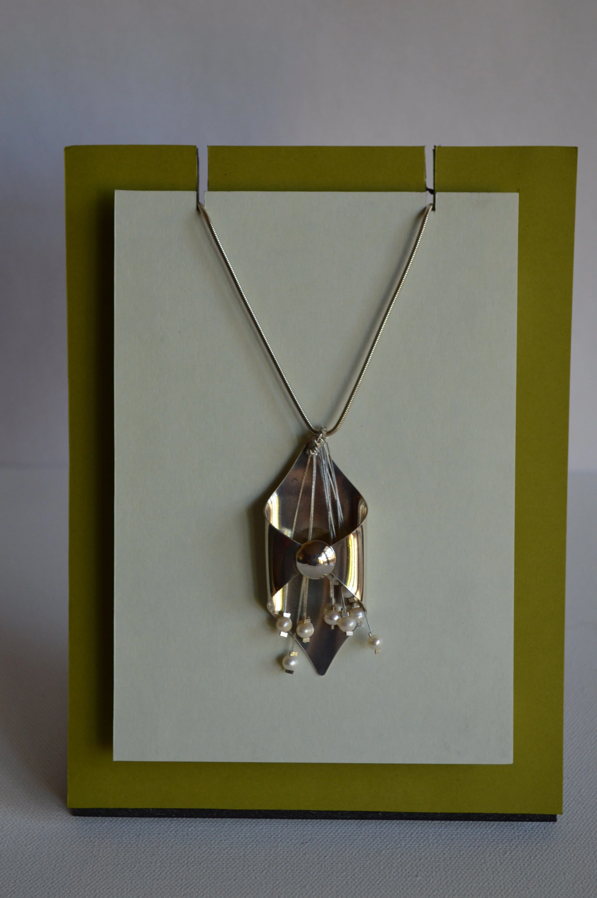 Folded Metal drop with Pearls