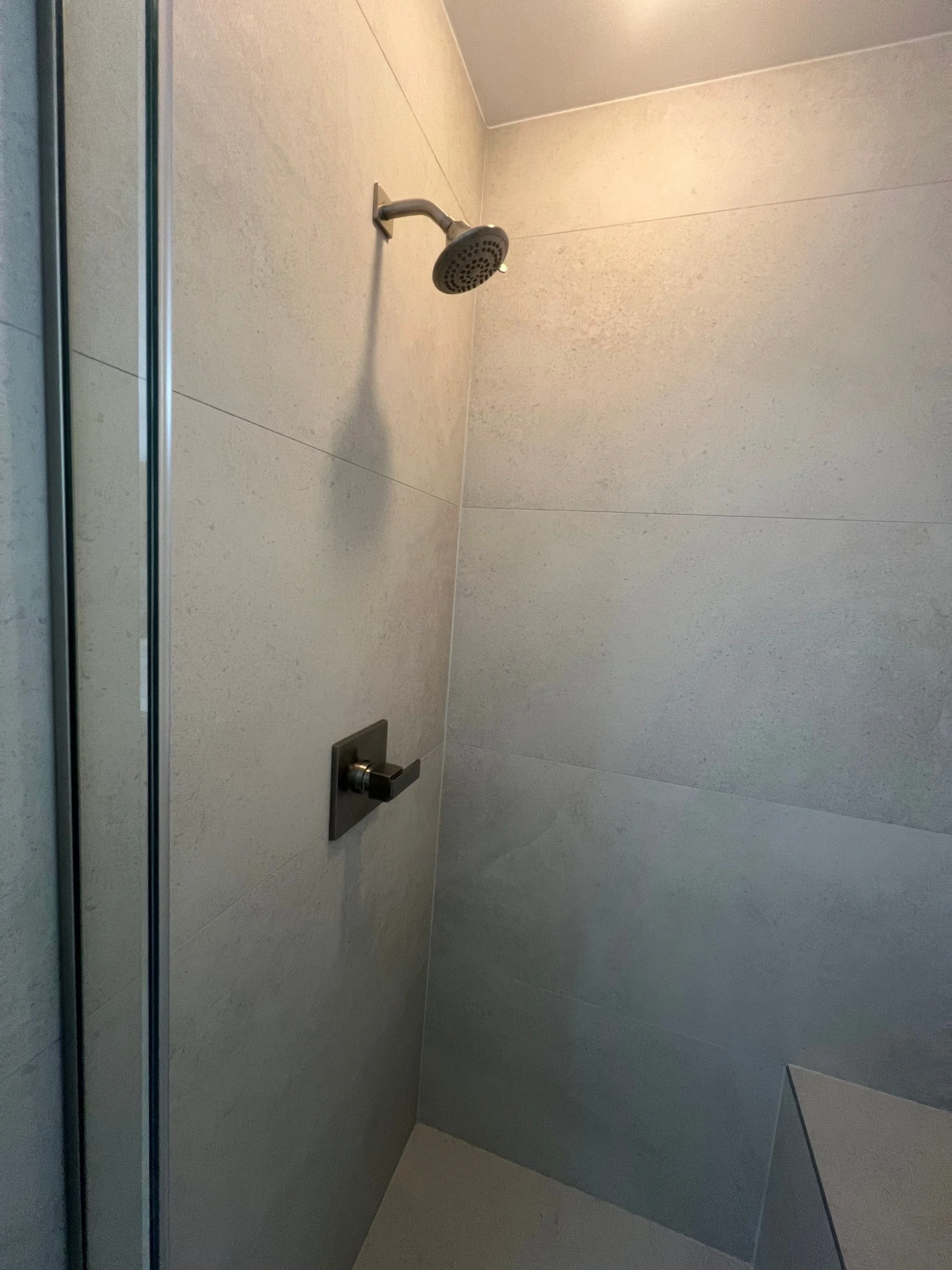 shower after renovation with stone-look porcelain time in large format with two recessed shower niches and one bench, new frameless glass door
Interior Designer - Chicago
interior design chicago
kitchen designer chicago
bathroom designer chicago