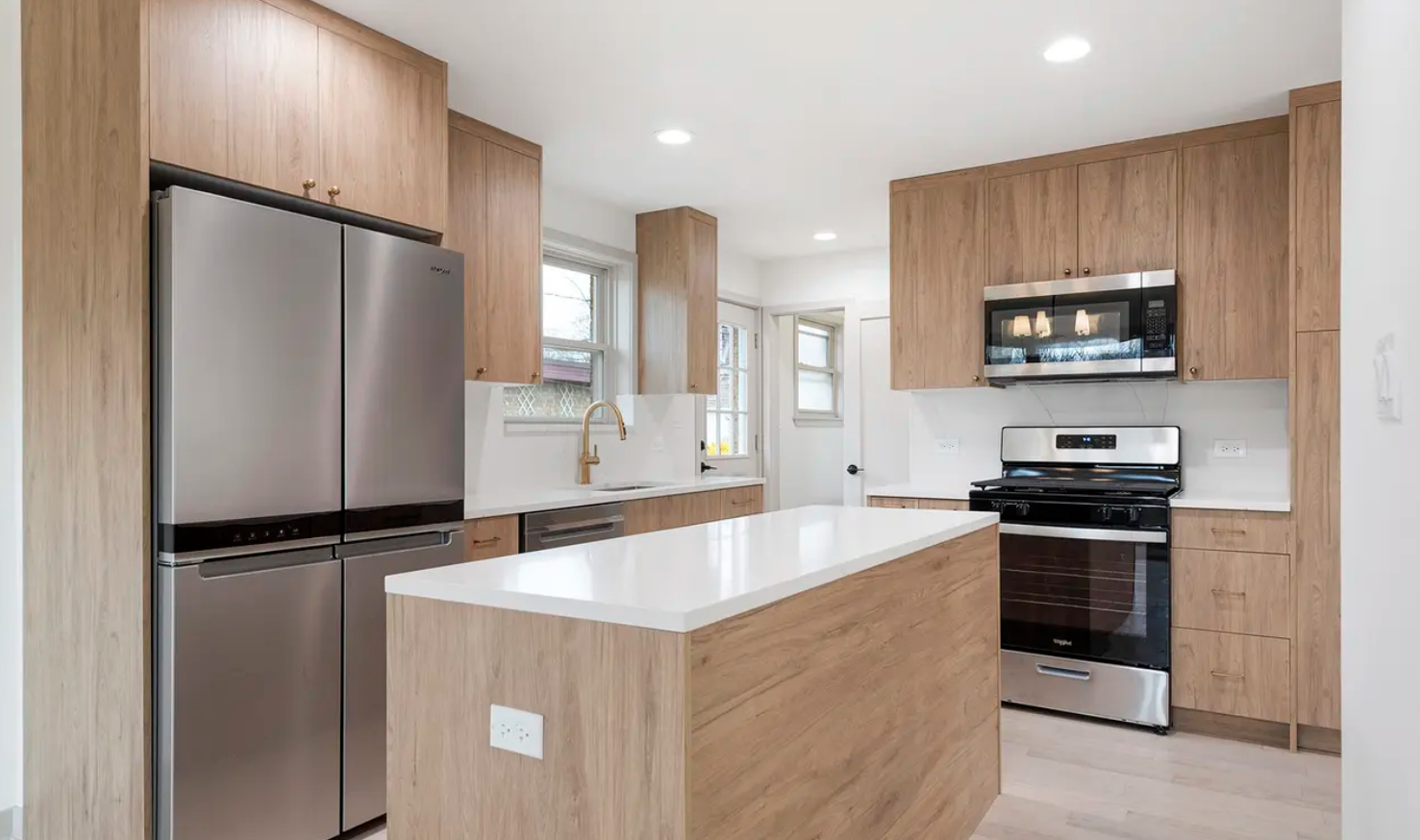 full home interior design and renovation in scandinavian minimal style with white oak floors, white oak cabinets, white quartz countertops and full quartz backsplash, appliance selection, lighting plans and schedules, arched hallway entries, front do