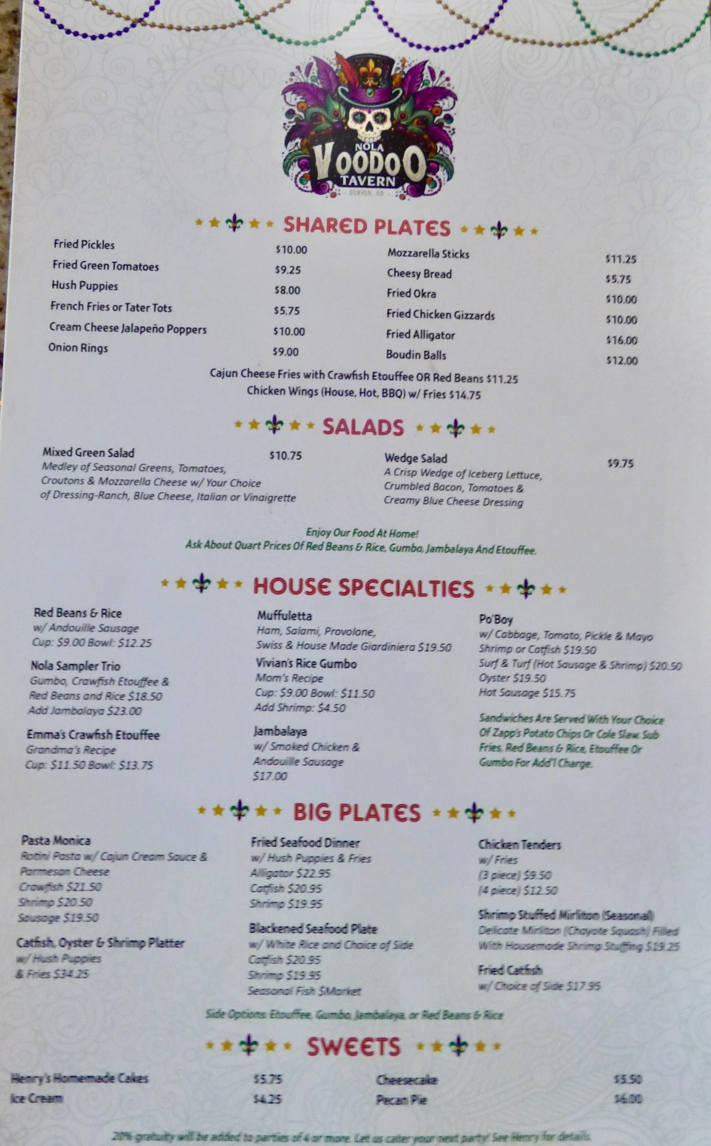 Menu from NOLA Voodoo Tavern featuring shared plates, salads, house specialties, big plates, and sweets at NOLA Voodoo Tavern, Denver, CO 80205.