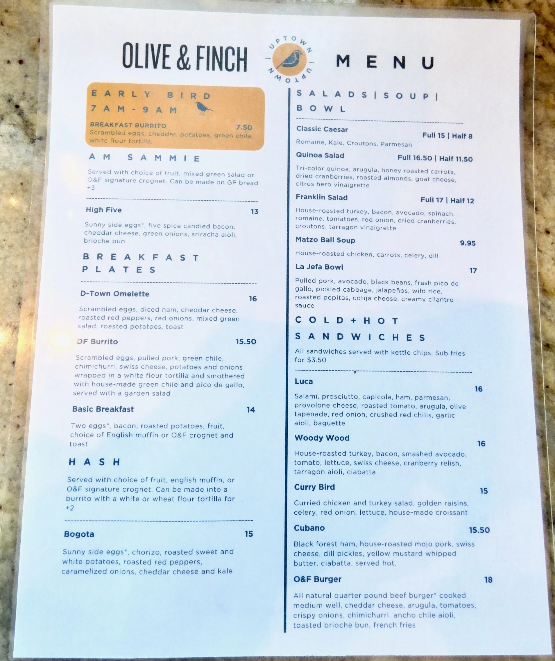 Olive & Finch restaurant menu featuring breakfast and lunch options, including sides, salads, sandwiches, and breakfast plates.