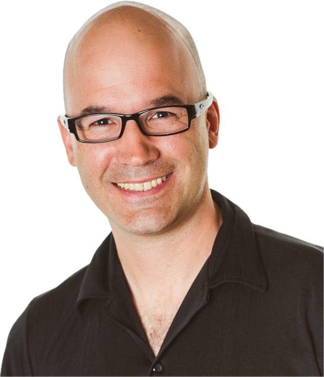 Portrait of a smiling bald man with glasses wearing a black collared shirt.