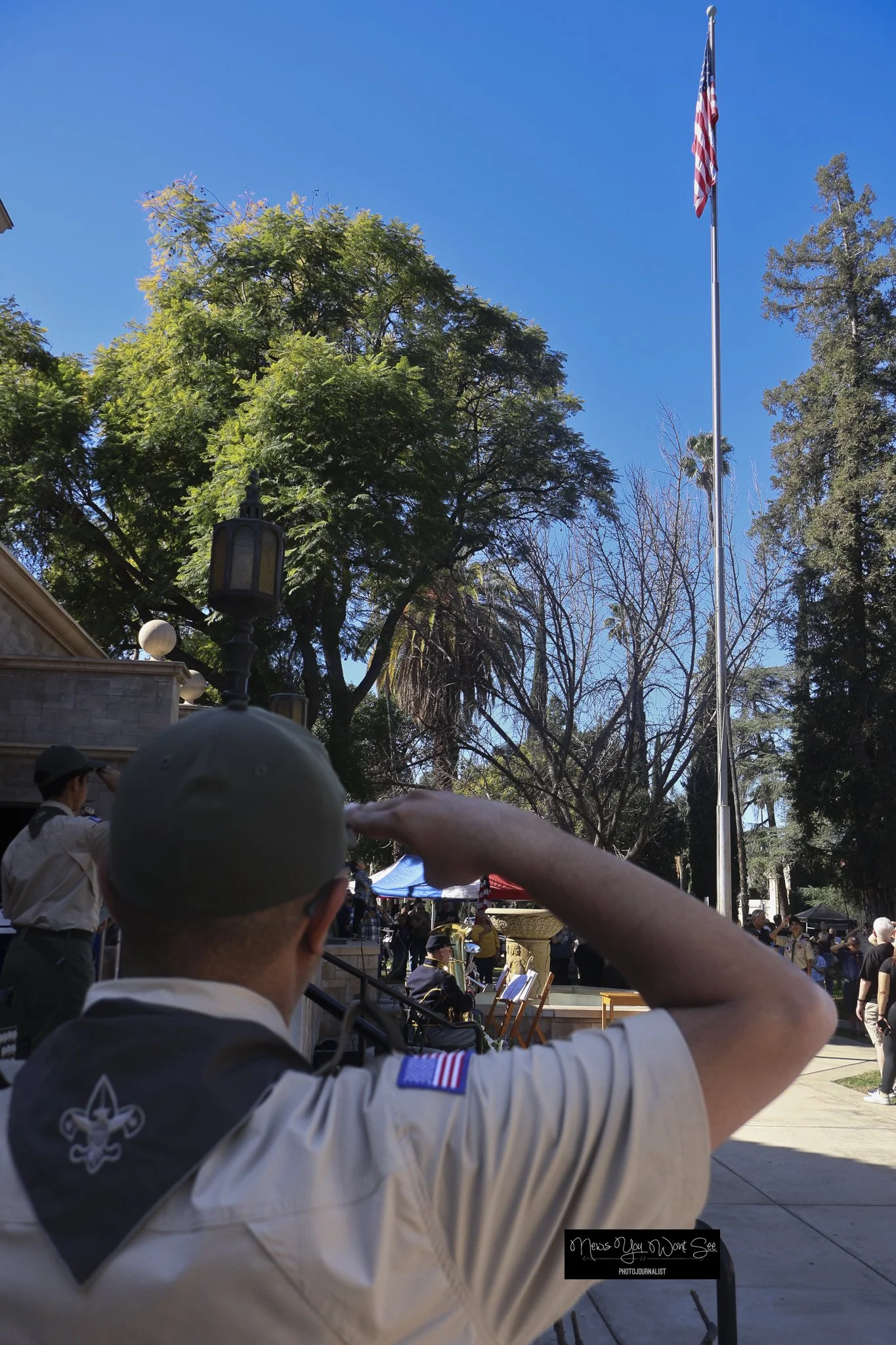  Ascout leader salutes the flag as mabers of Troup 3.. razes it during the Lincoln Pilgrimage at the Lincoln Shrine on February 6th, 2026. (Photo by Brian Spears, Redlands Collective News) 