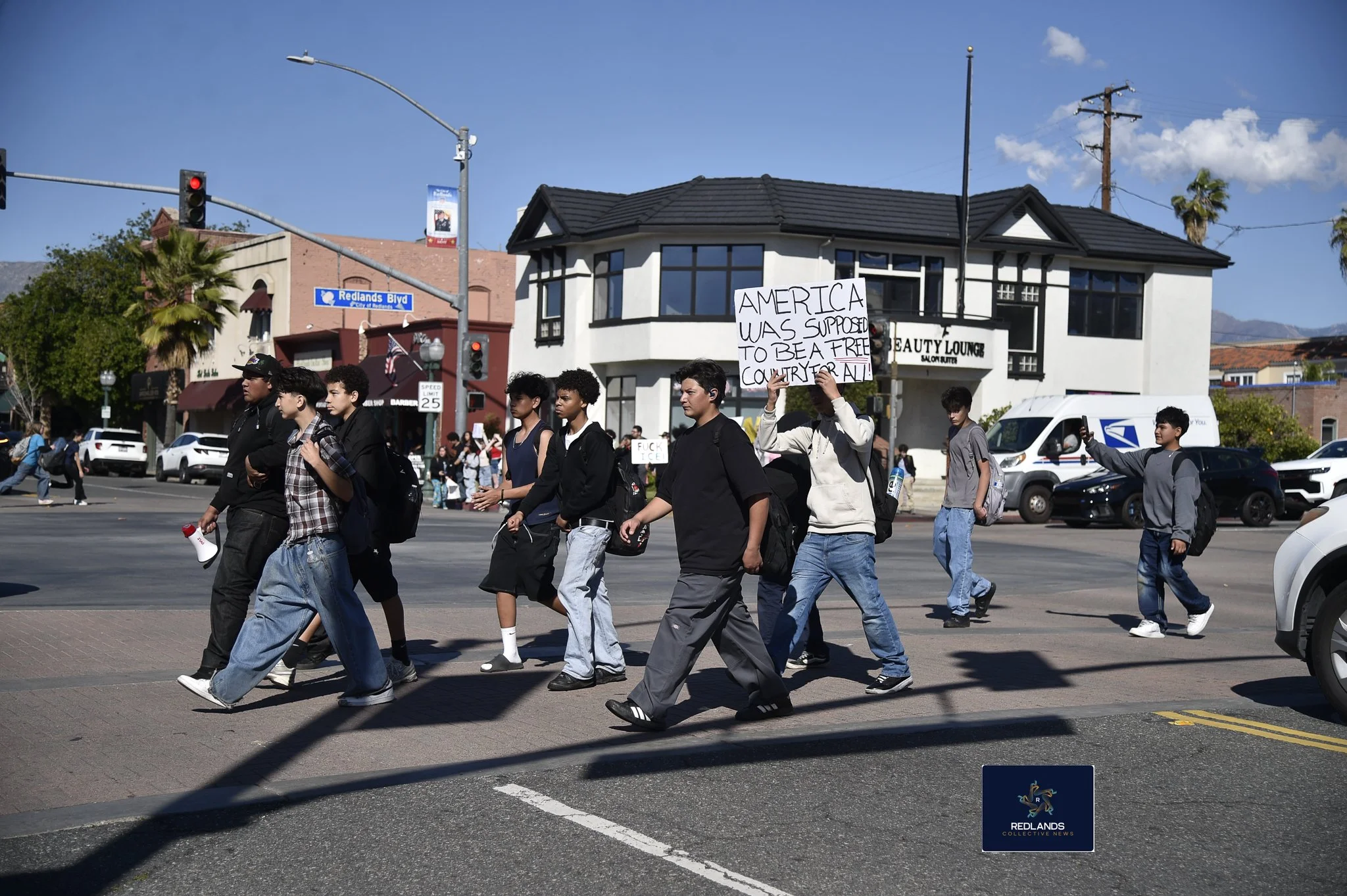  students walk out of school against ICE Feb. 13, 202,6 in downtown Redlands (Photo by Brian Spears, Redlands News Collective)  