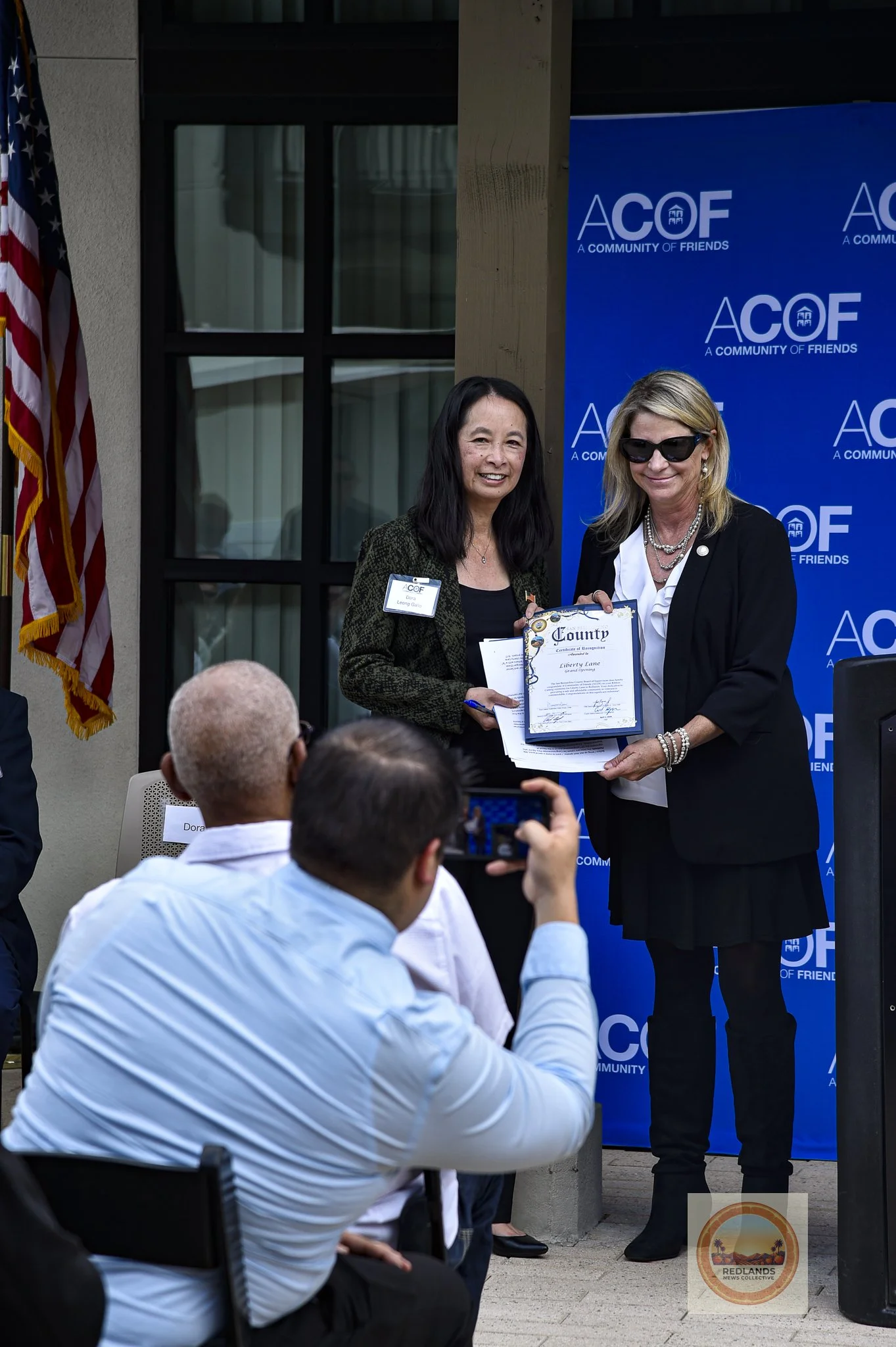  President and CEO of A Community of Friends, Dora Leong Gallo  receives a certificate from the San Bernardino County Third District Supervisor Dawn Rowe, Dawn Rowe, at the ACOF Liberty Lane Ribbon Cutting on April 1, 2026 (Brian Spears, Redlands New