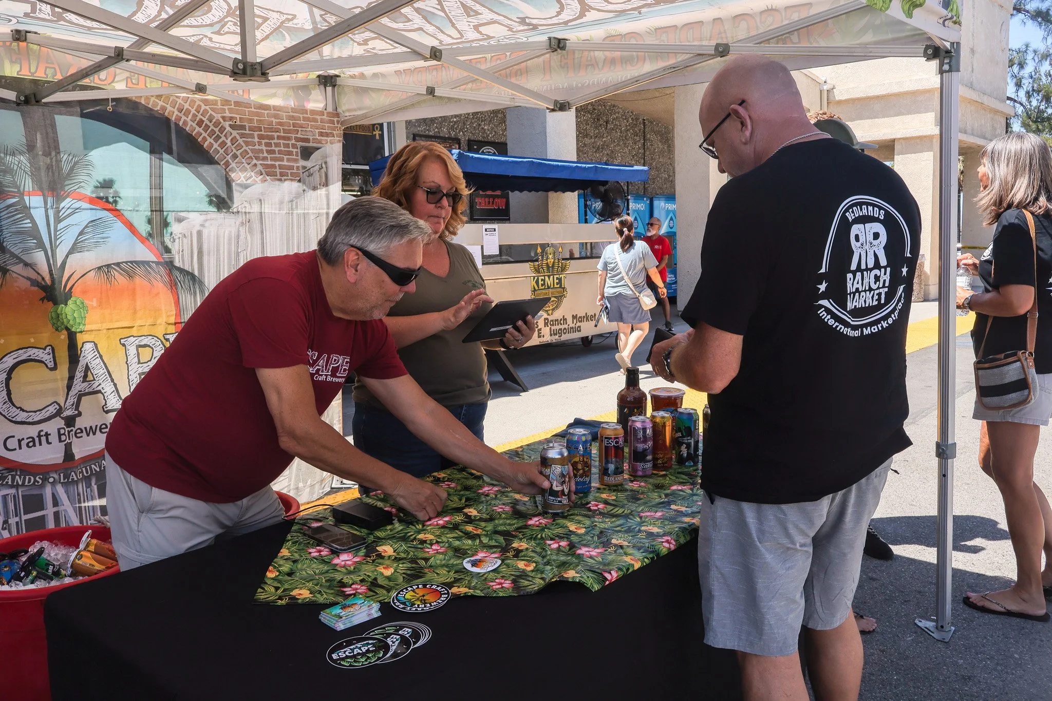  Members of Escape Brewery serve beer at Redlands Ranch Market's 30th Anniversary  Aug. 8, 2026 (Brian Spears, RNC). 