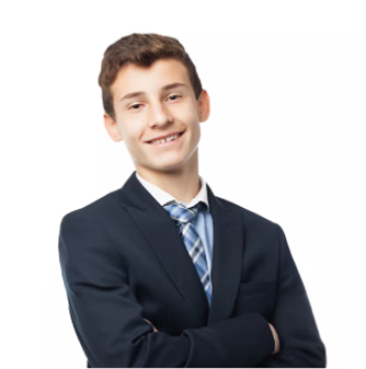 Young man in a navy suit and tie smiling with arms crossed