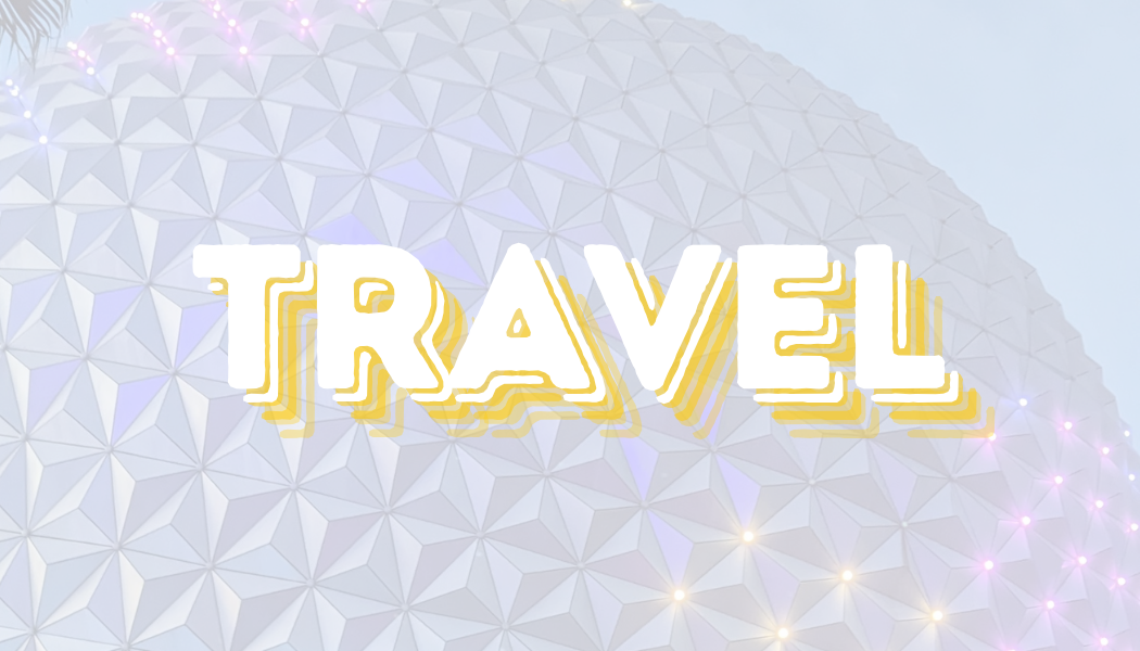 The word "TRAVEL" in bold, stylized yellow and white text against a futuristic, geodesic sphere background with glowing lights.