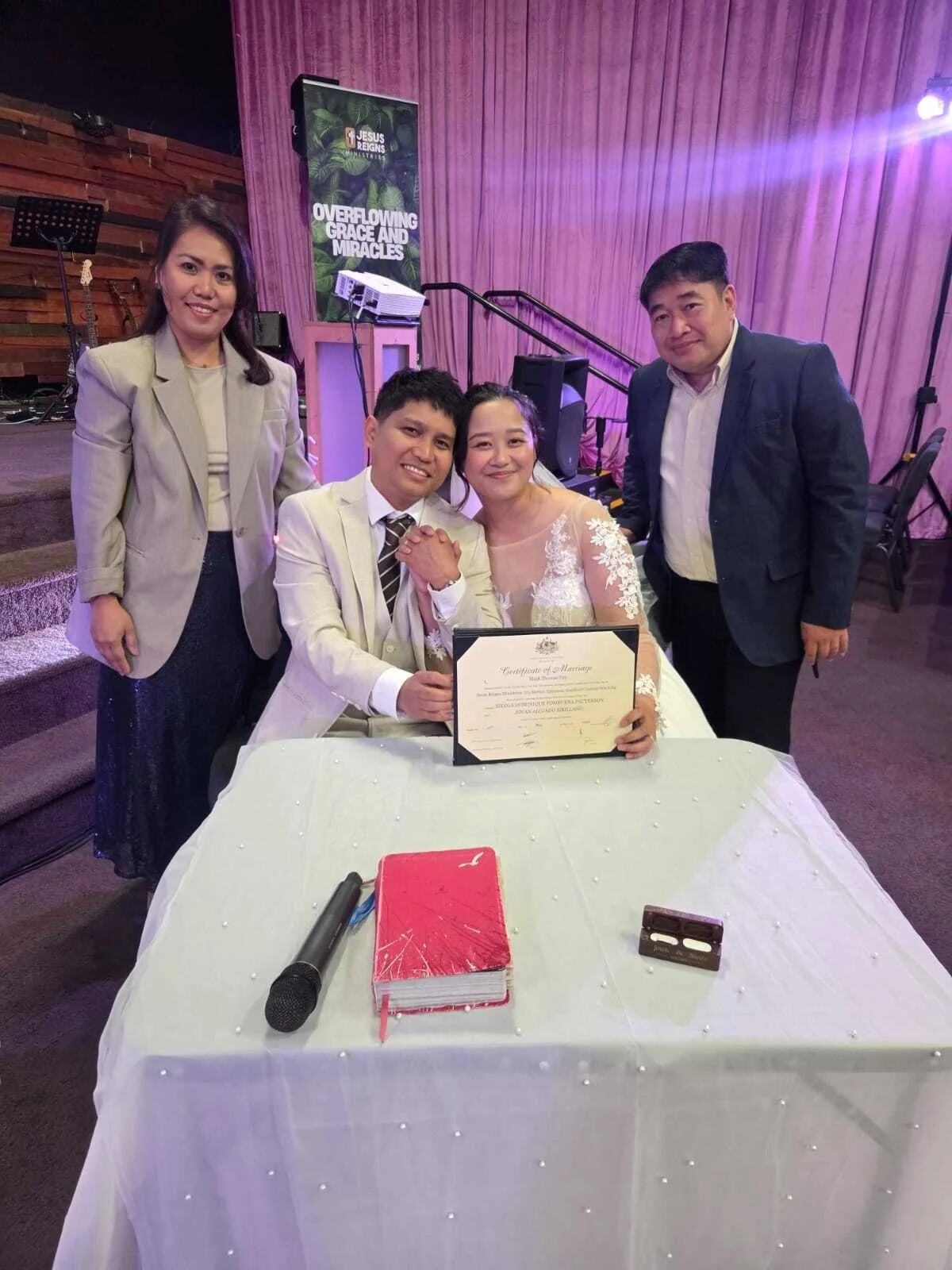 bride-and-groom-signing-marriage-certificate