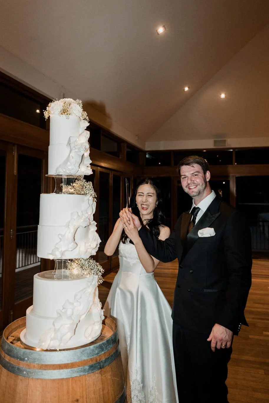 cake cutting ceremony of couples
