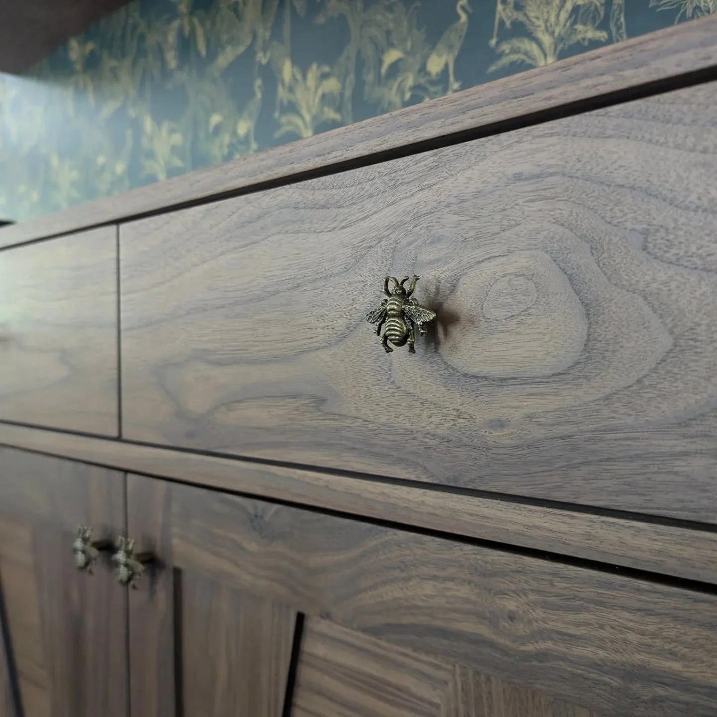 The bourbon bar is in its new home! The clients needed a new bar but also a dog crate so we designed them together. The bottom left has sliding doors that open up to a dog crate. The bar features multiple storage drawers along with 2 more drawers in 