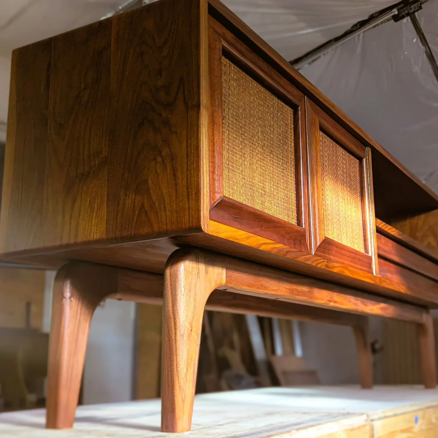 The Walnut sideboard is delivered and in its new home. This was an interesting challenge. The client approached me with a cabinet that had been passed down to her (cabinet is in the last photo) and commissioned me to make something completely new, bu