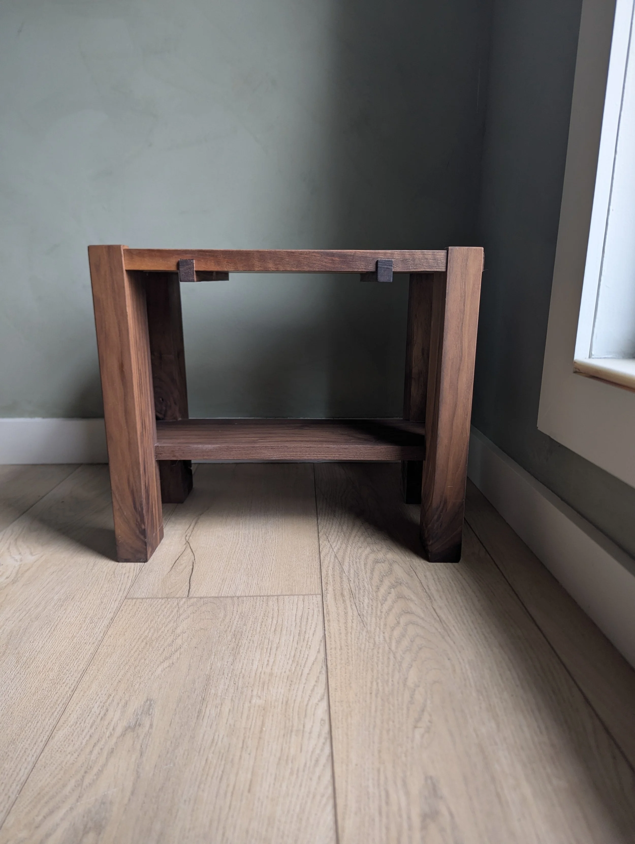 Walnut architectural wooden kitchen stool with exposed joinery