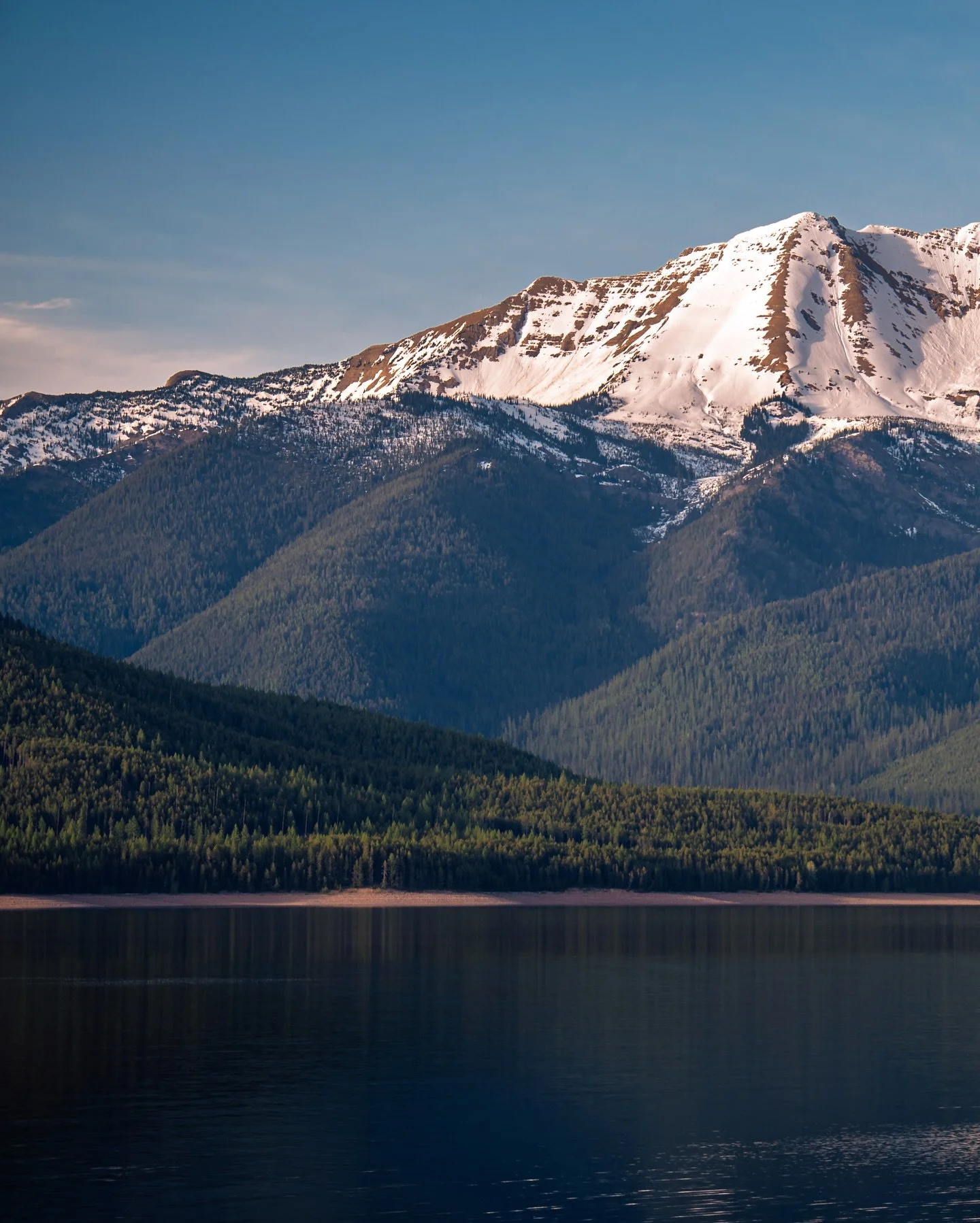 I don&rsquo;t know if it&rsquo;s the snow still on the mountains or the quiet stillness of a shoulder season sunset before summer really kicks off, but I sure enjoy springtime in Montana. 
&bull;
&bull;
&bull;
#MontanaMoment #BigSkyCountry #TreasureS
