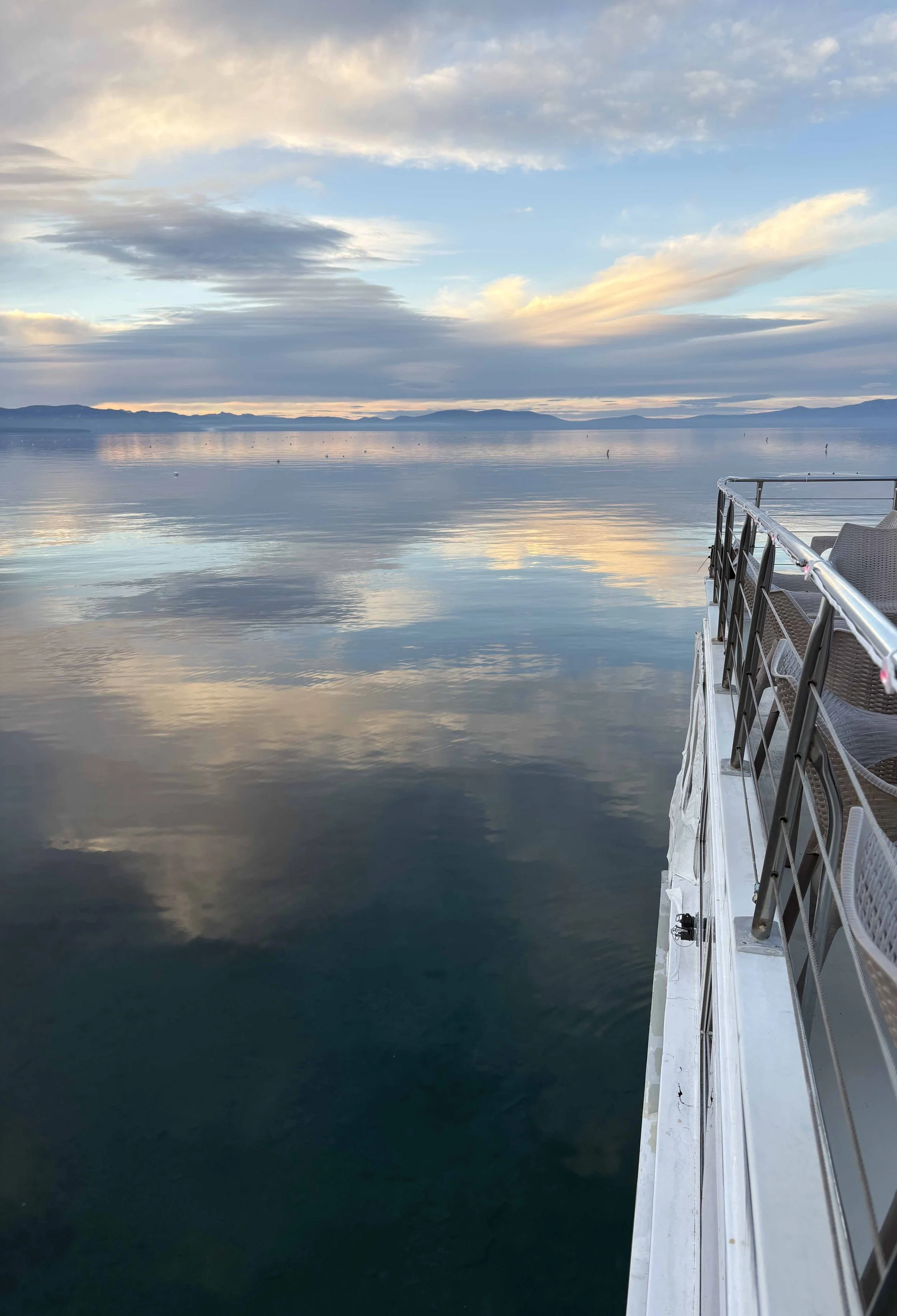 A perfectly calm Lake Tahoe during dusk hours