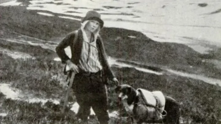 Homesick Alaska woman dog.webp