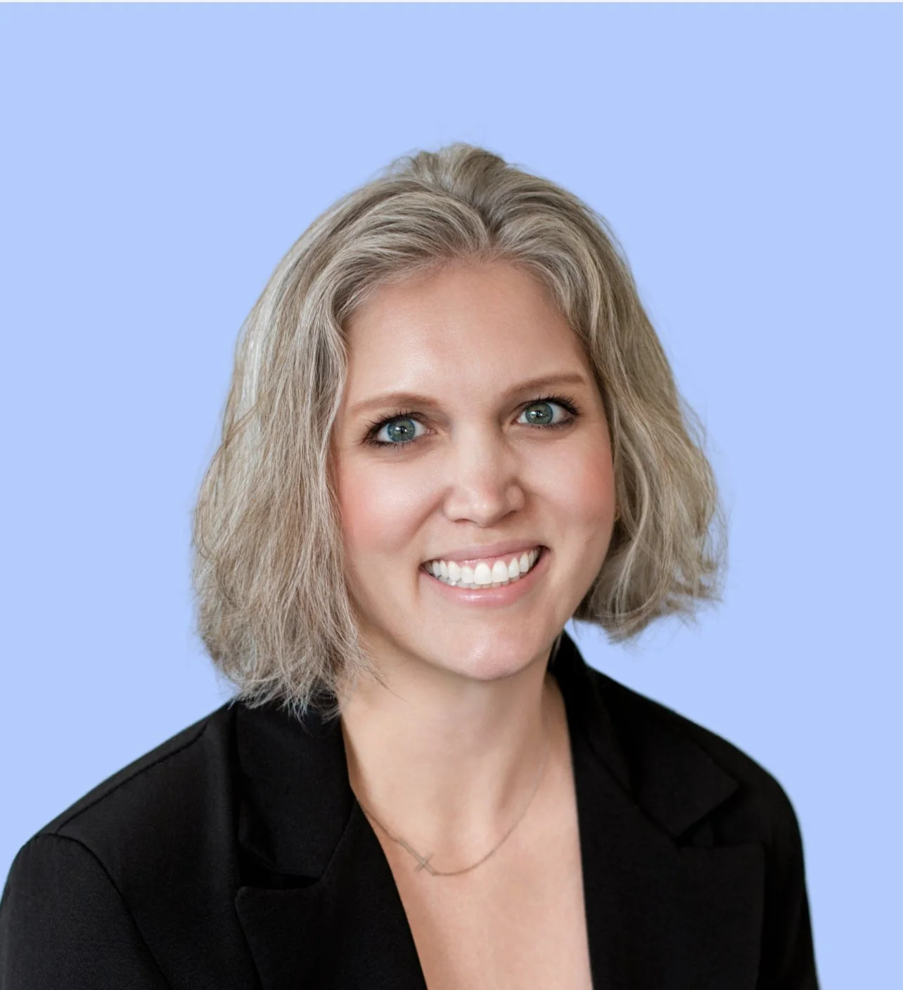 Headshot of Eliza Russ, owner and therapist.