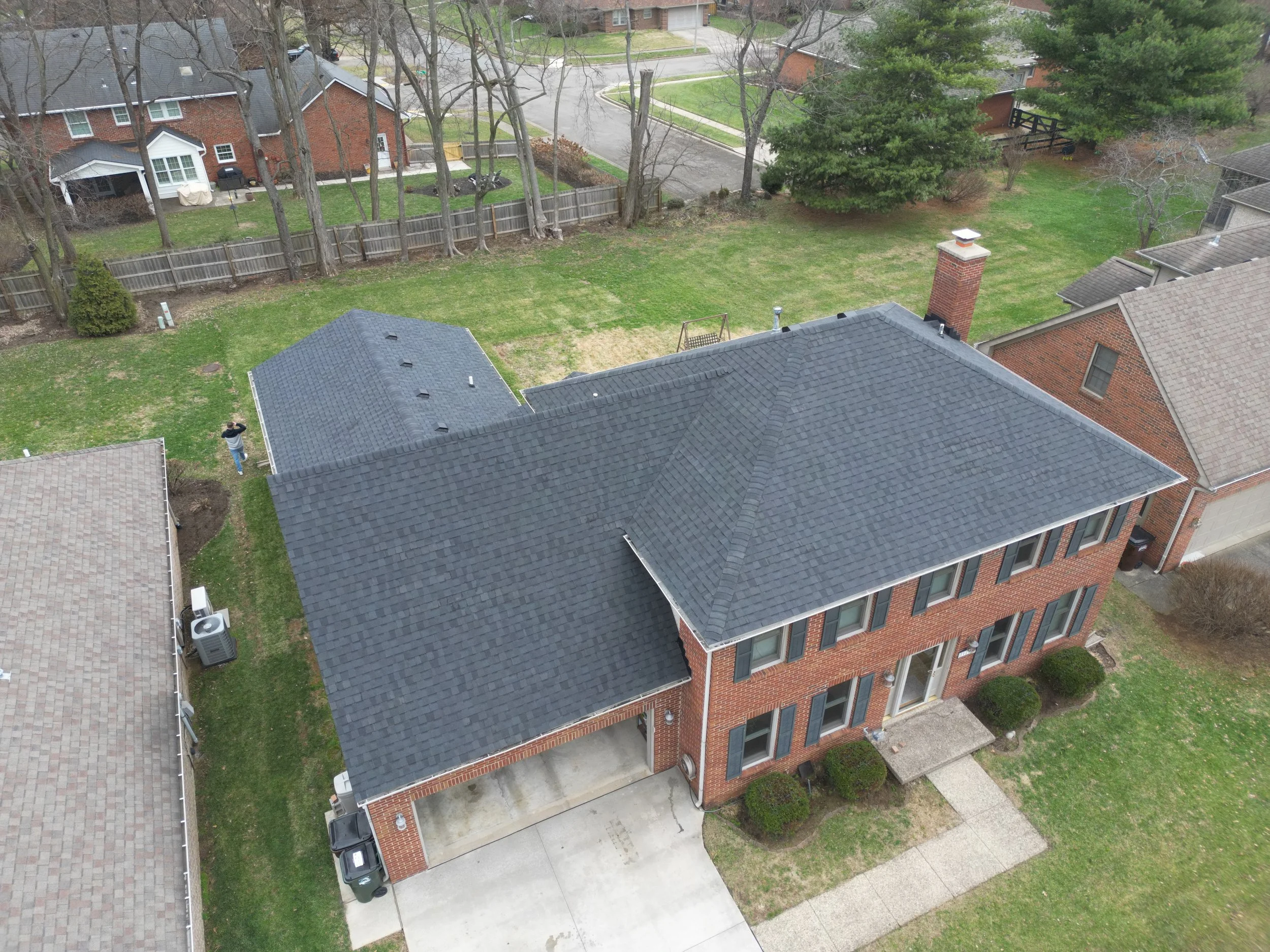 New Owen's Corning Duration Onyx Black asphalt shingle roof installation in Lexington KY residential neighborhood by Roof Rx