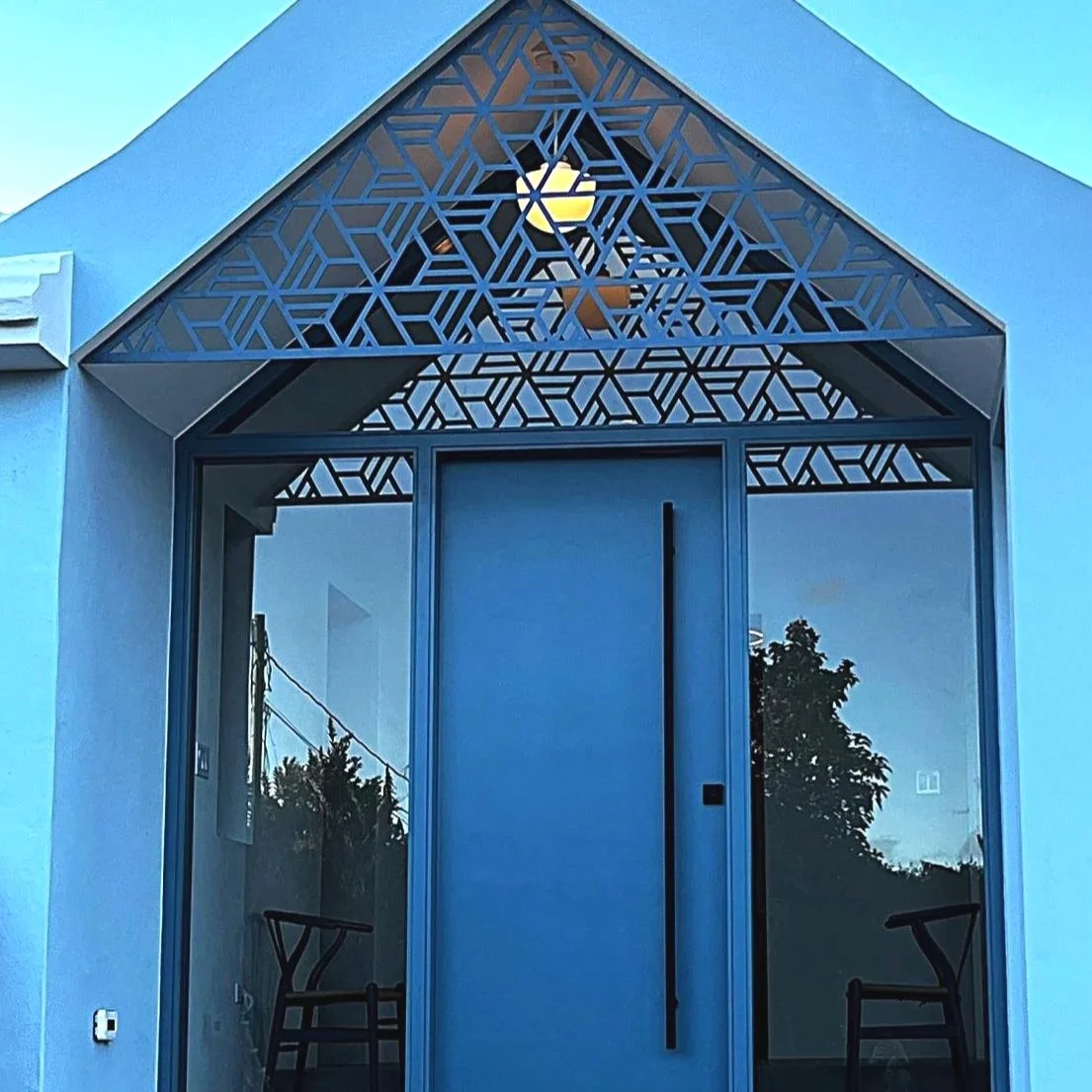Bermuda private residence . Laser cut entry panels