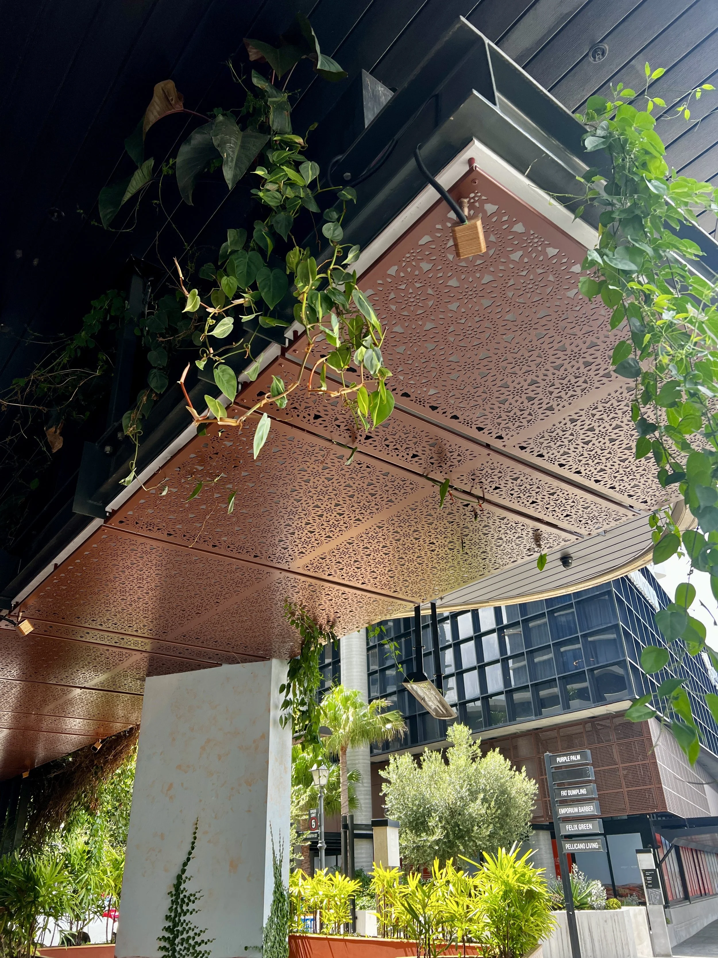 Commercial fit out. Ceiling panels back lit. Urban metal Lace design. UNITA