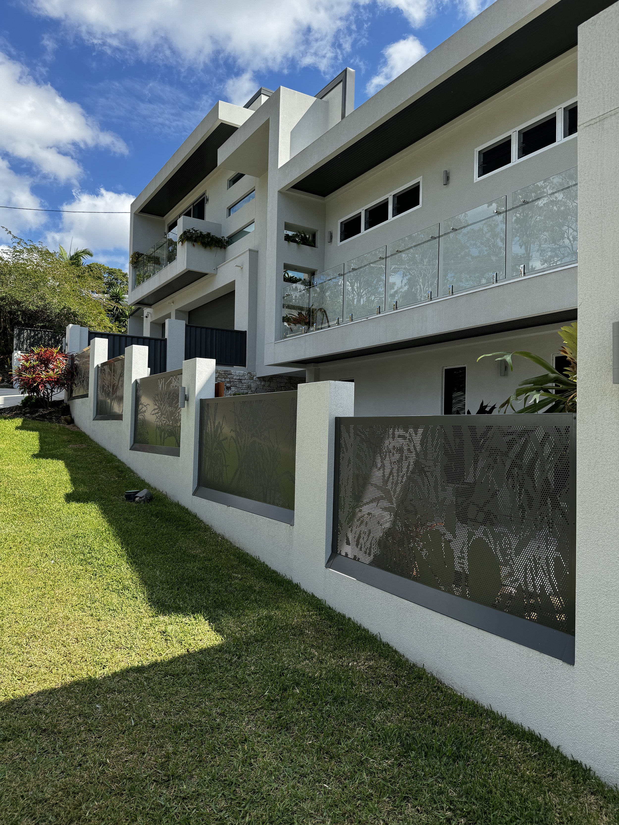 Perforated custom design fence panels. Beach house perforated panels. pic perf. pandanus design. custom perf screens
