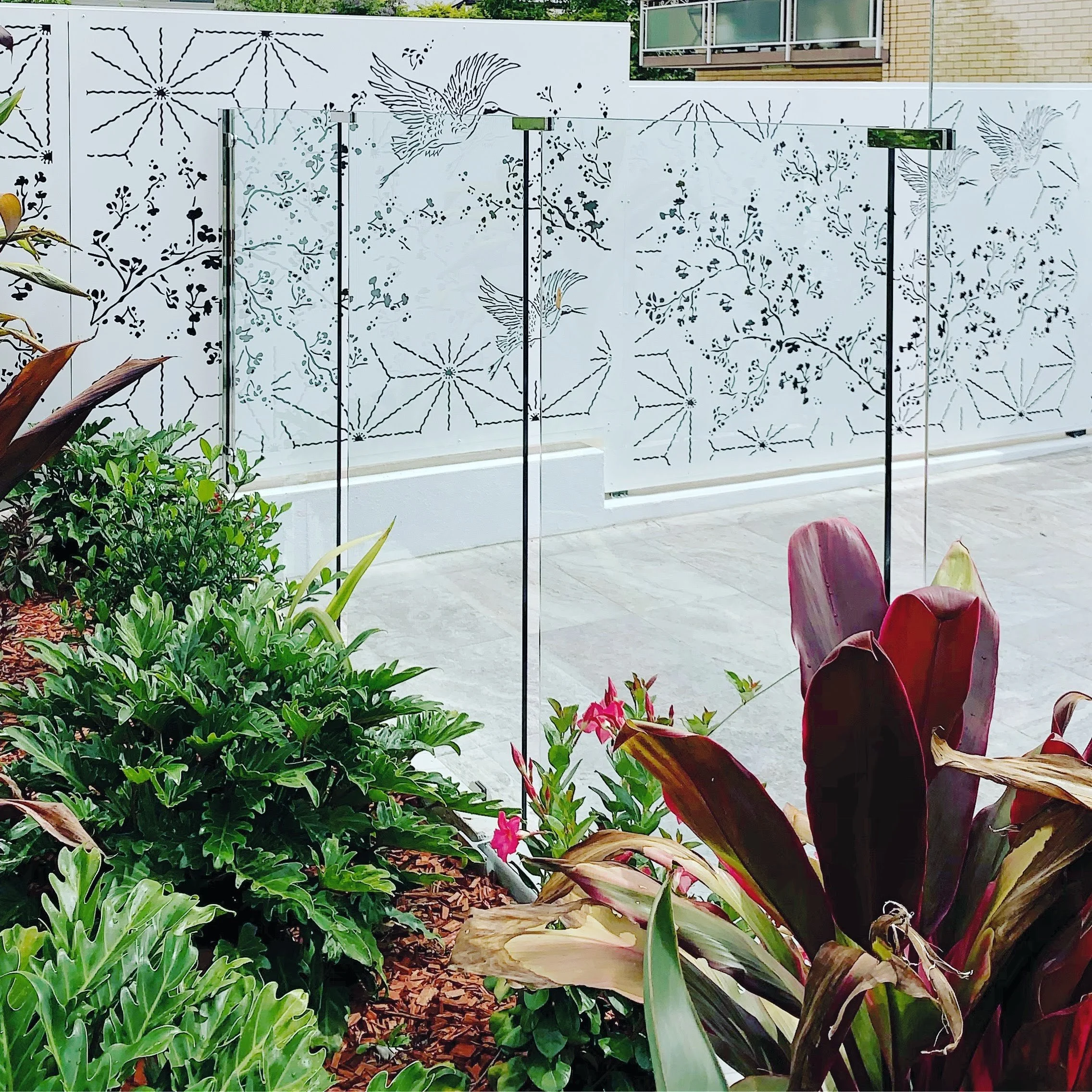 Japanese inspired landscaping fence panels. laser cut design. urban metal. privacy screens