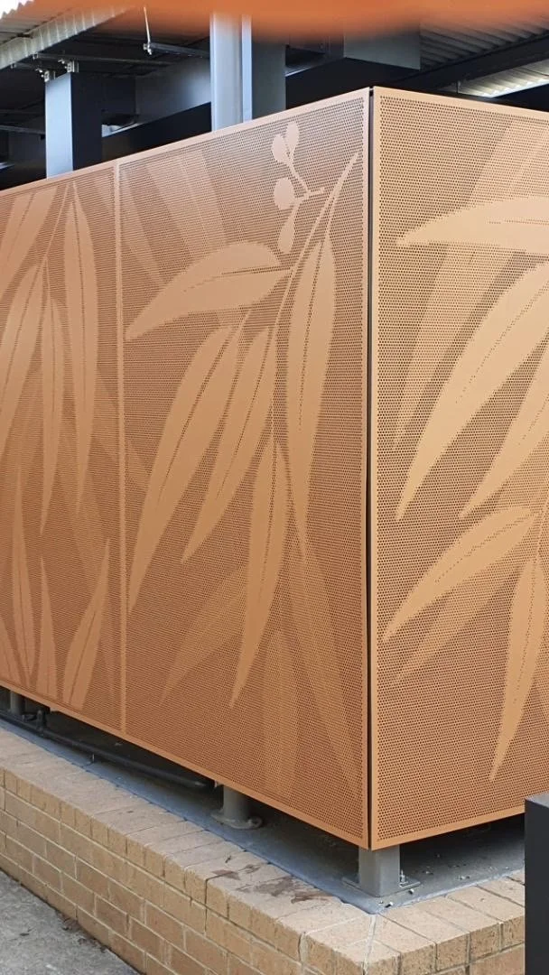 botanical design custom perforated screens. gum leaf design. privacy screening. pic perf. bin enclosure. amenities enclosure perforated screening