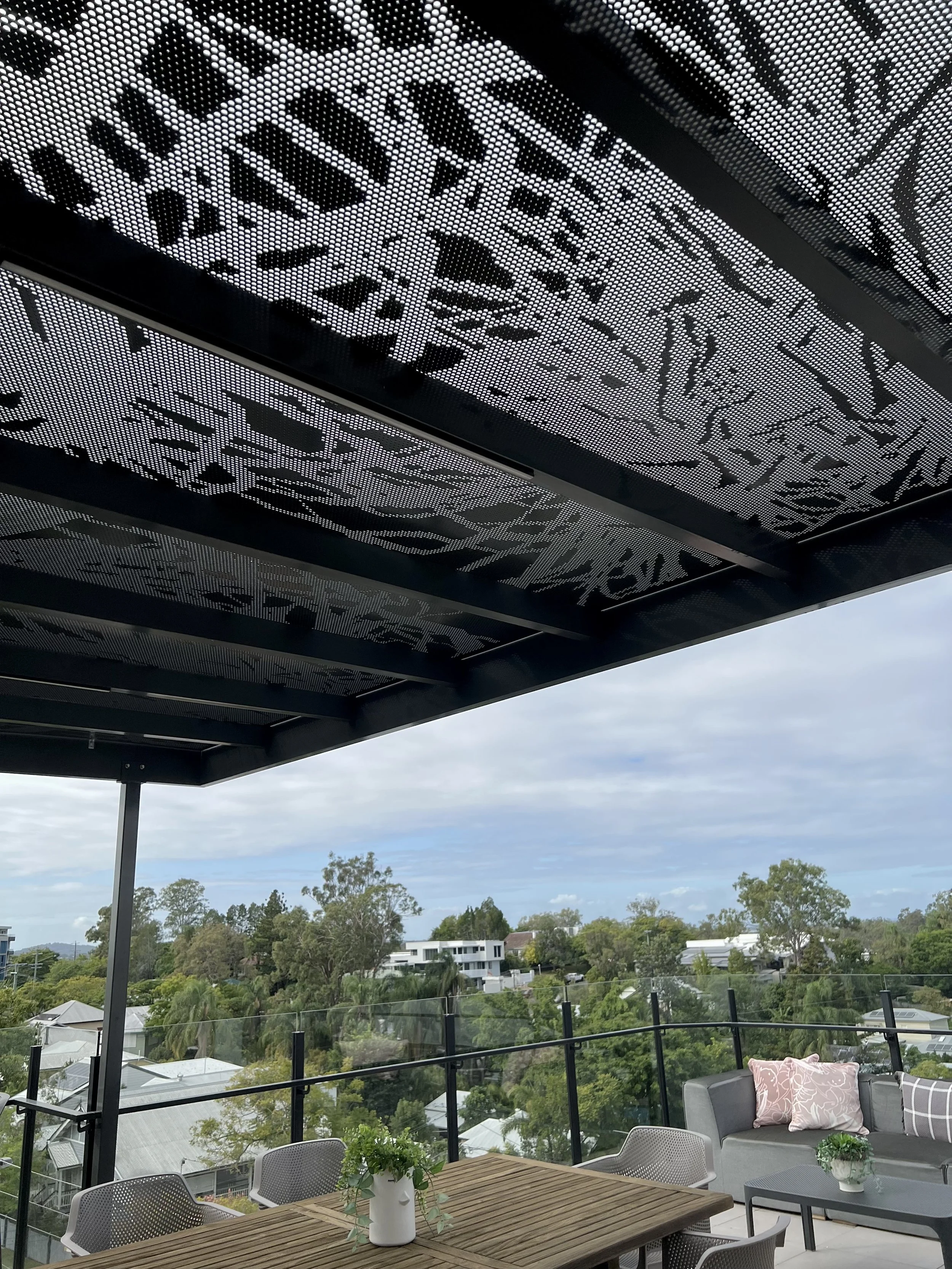 perforated shade canopies. perforated apartment screens. shade screens. outdoor perforated panels. custom designed perforated panels